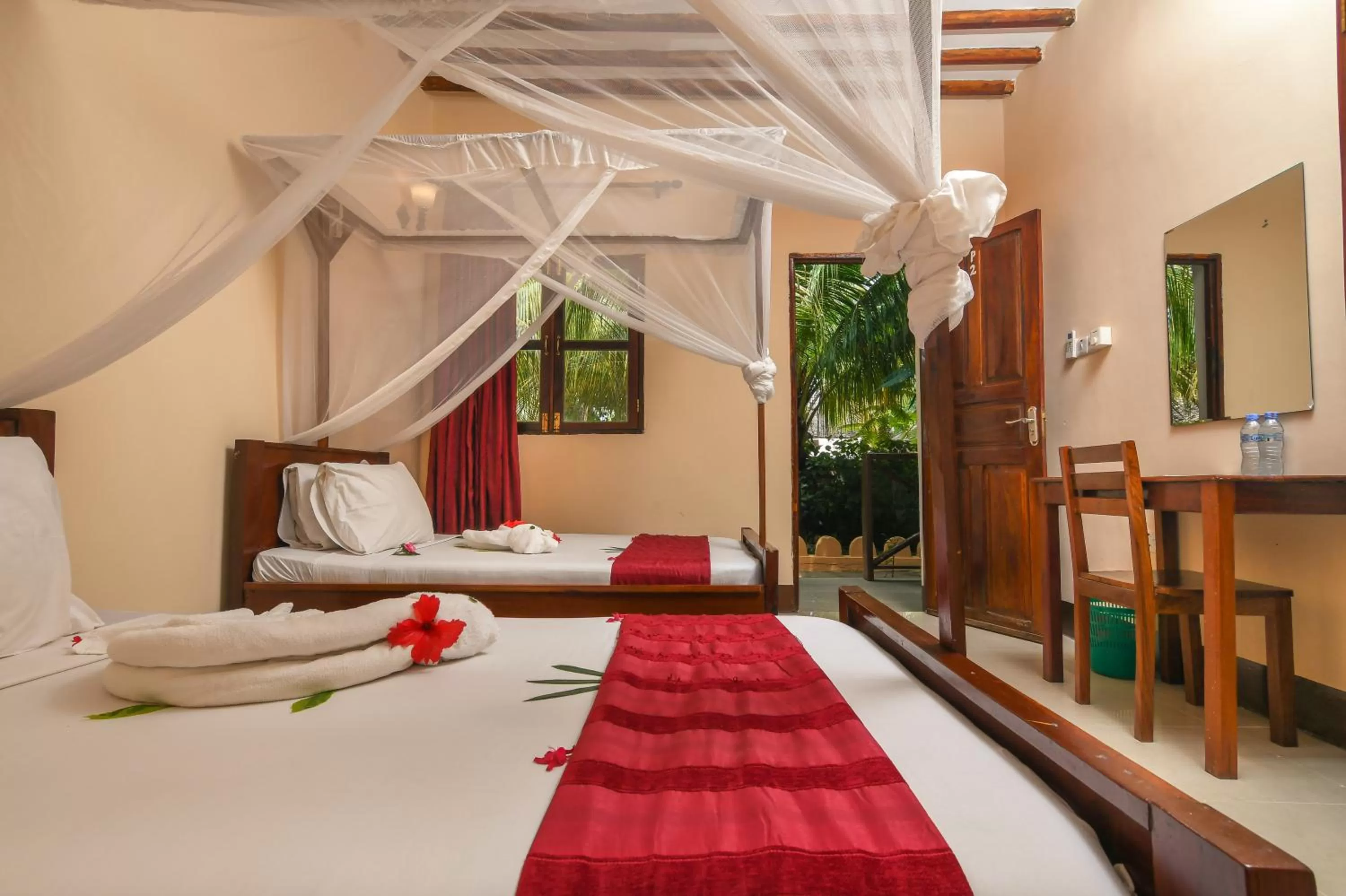 Bed in Amaan Beach Bungalows