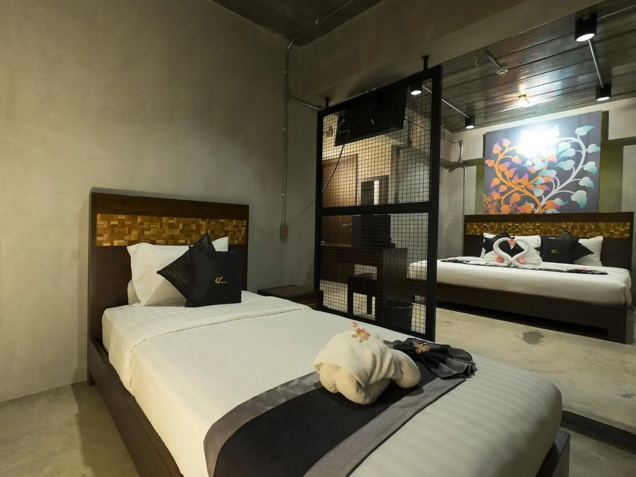 Photo of the whole room, Bed in Thapae Loft Hotel (SHA Certified)