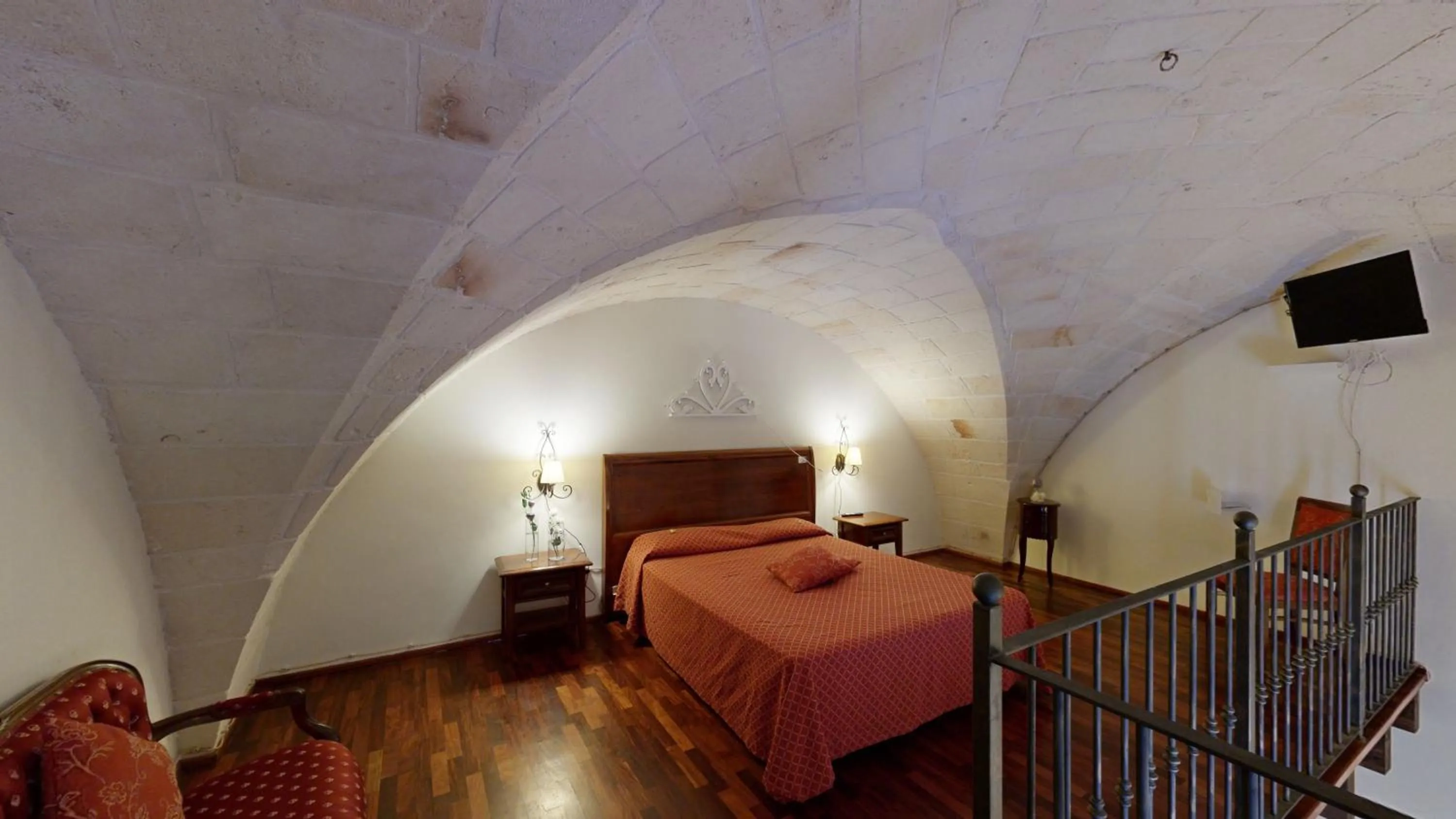 Bed in Relais Reggia Domizia