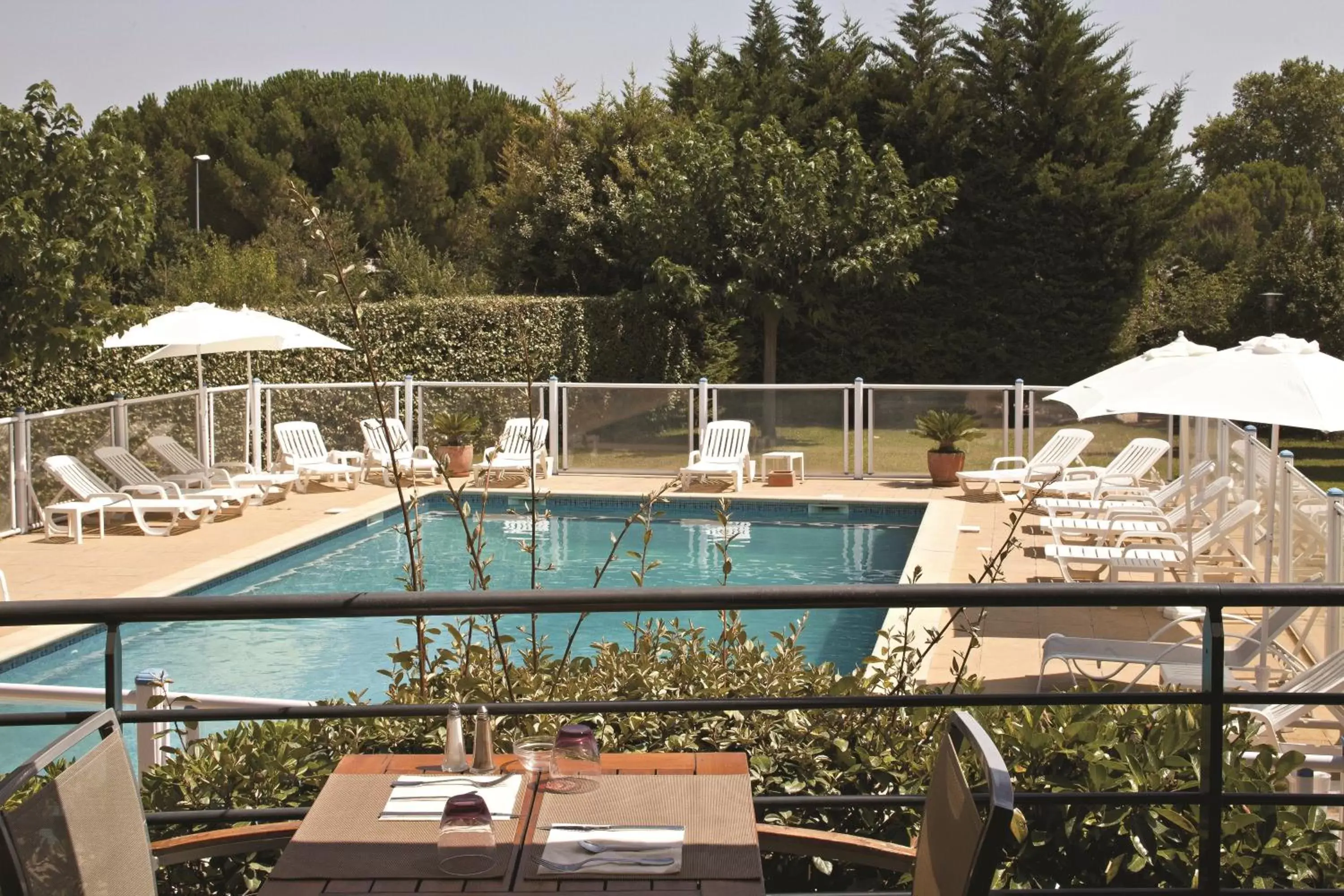 Balcony/Terrace, Pool View in Kyriad Montpellier Est - Lunel