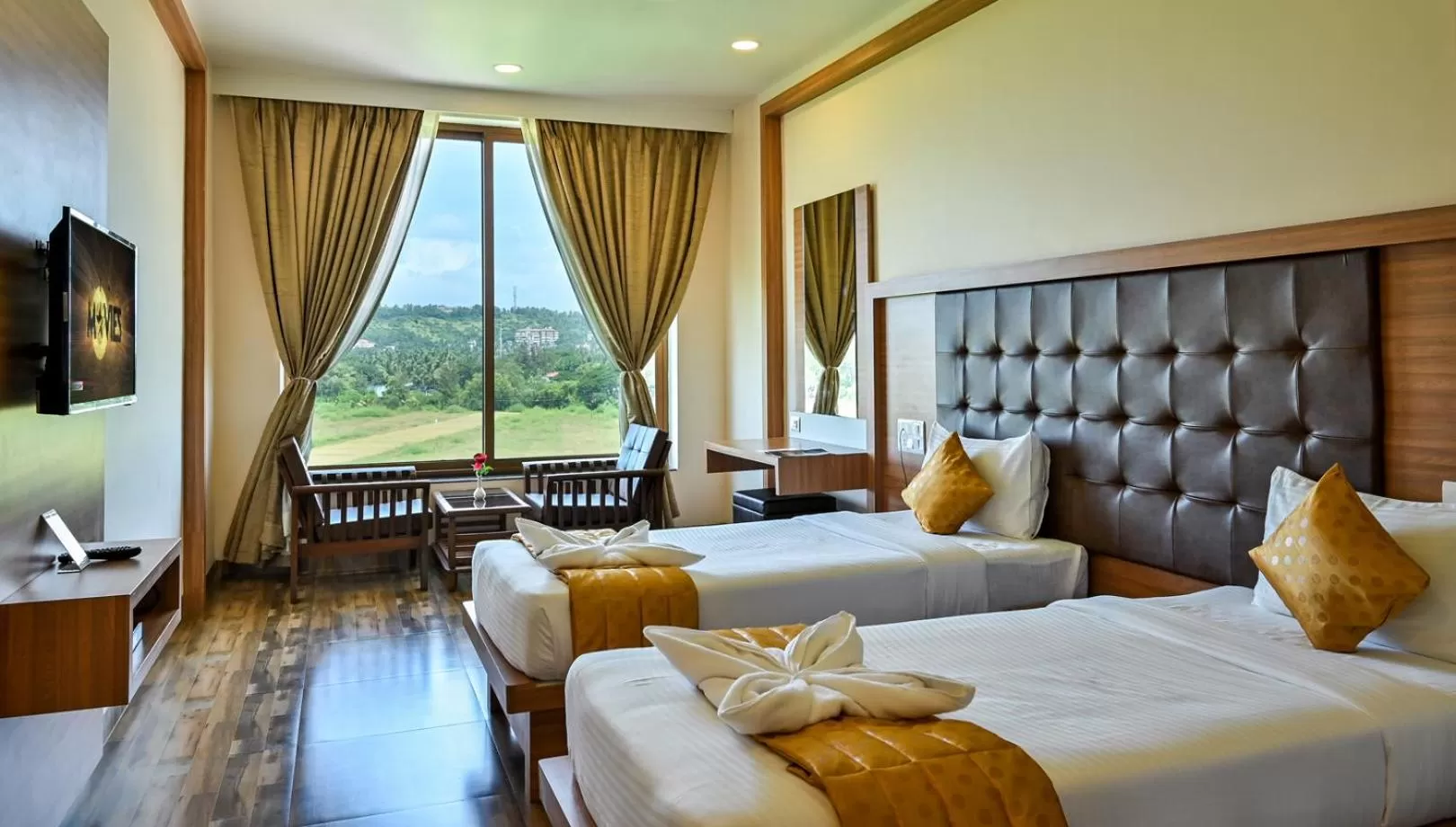 Bed in Hotel Laxmi Empire