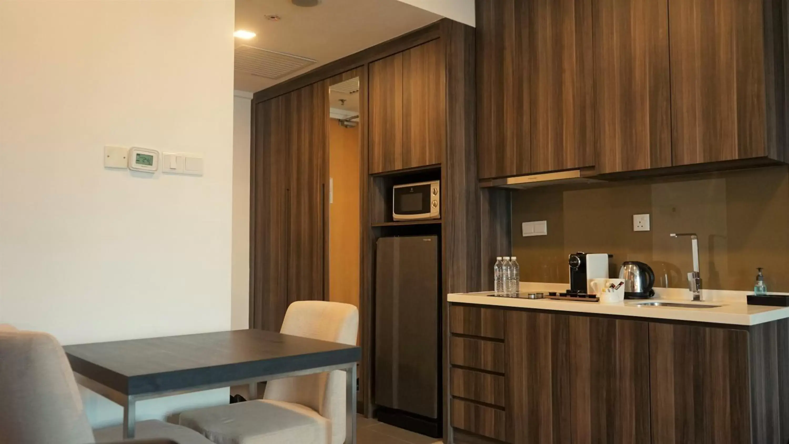 Kitchen/Kitchenette in Ramada Suites by Wyndham Kuala Lumpur City Centre