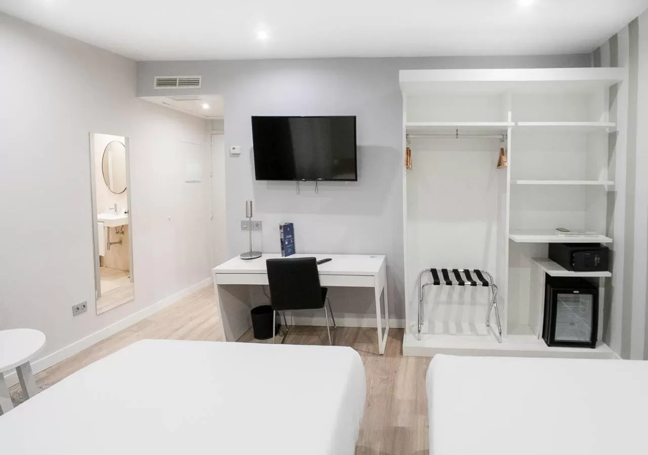 Bed in Hotel Pasarela