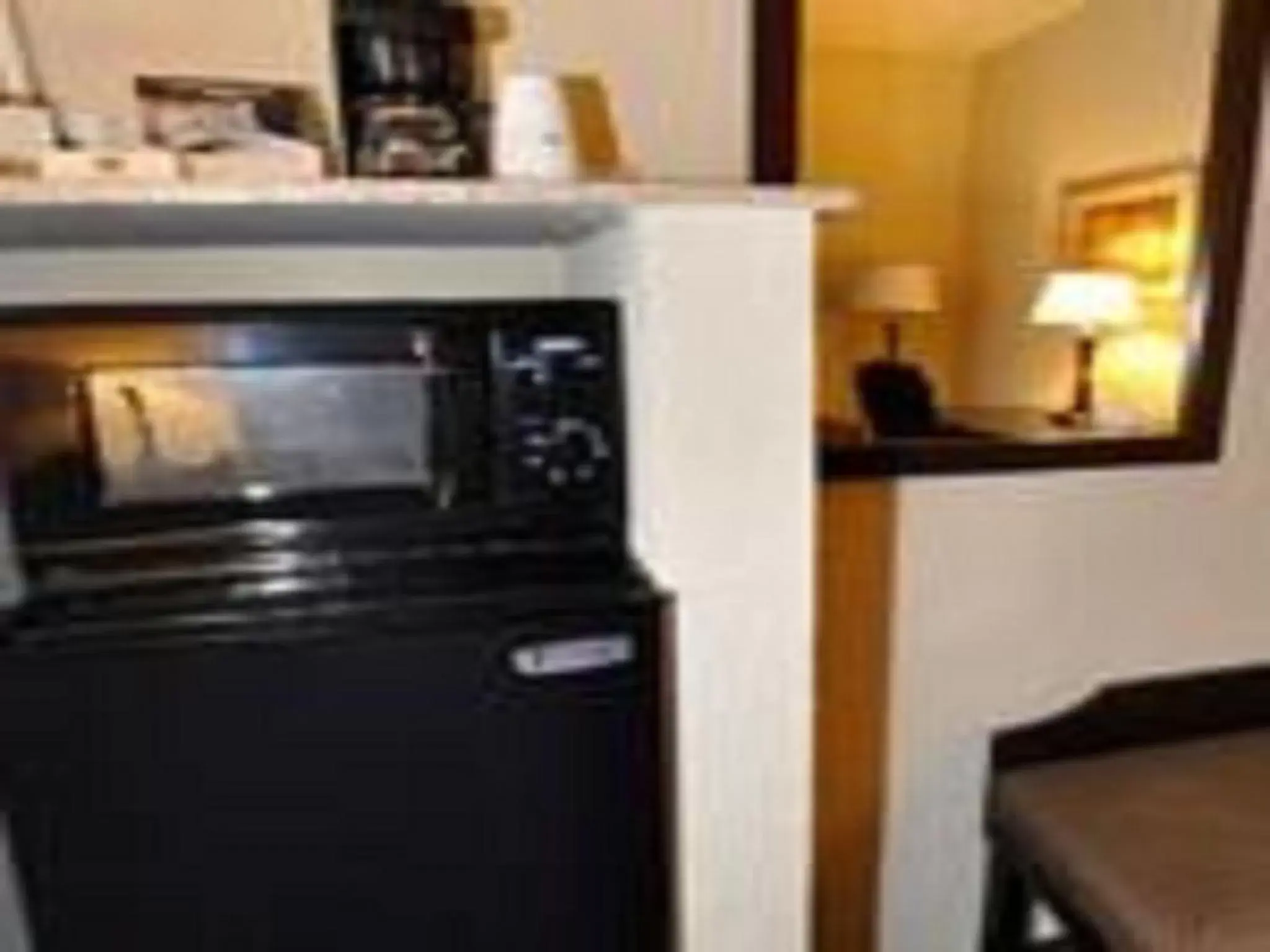 Kitchen or kitchenette, Kitchen/Kitchenette in Days Inn by Wyndham Semmes Mobile