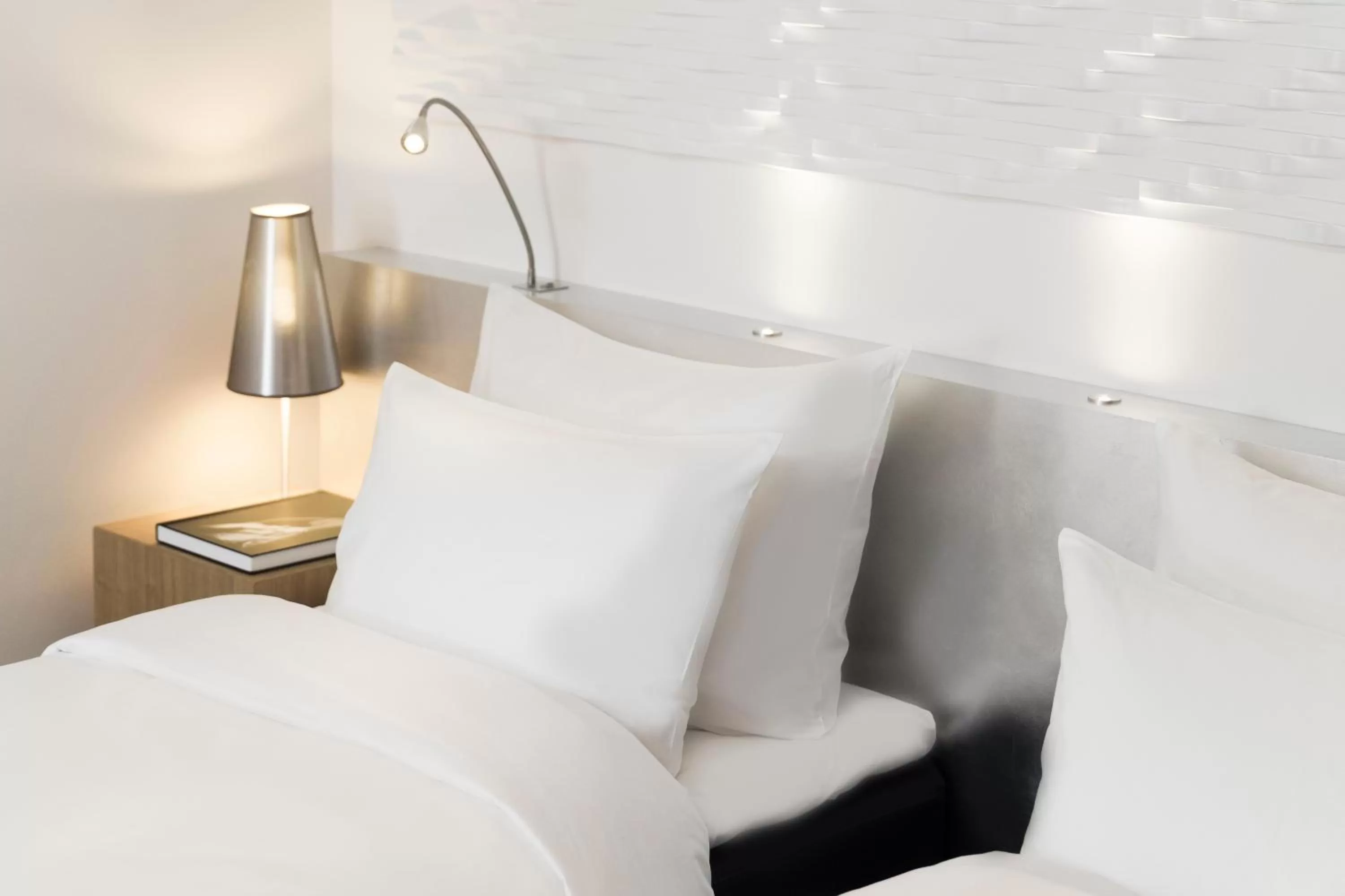 Bed in Radisson Blu Scandinavia Hotel Aarhus