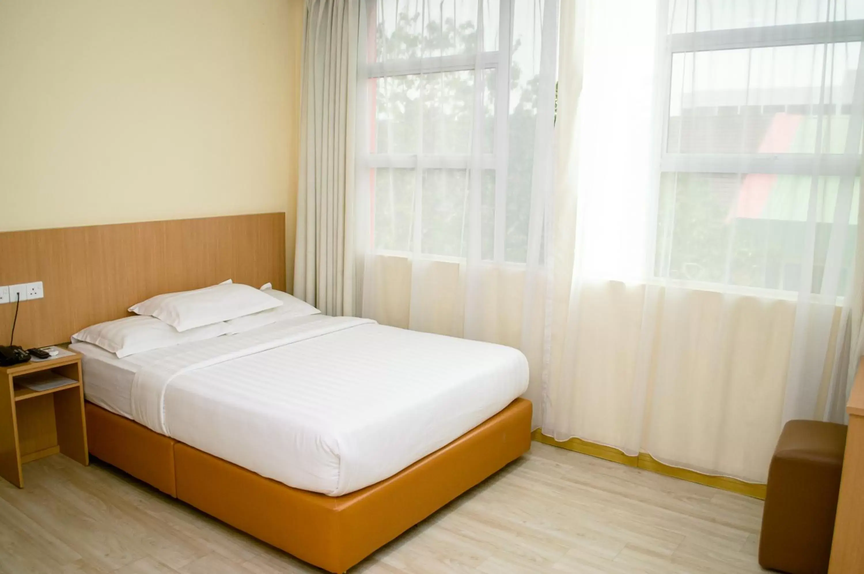 Bed in Labuan Avenue Hotel