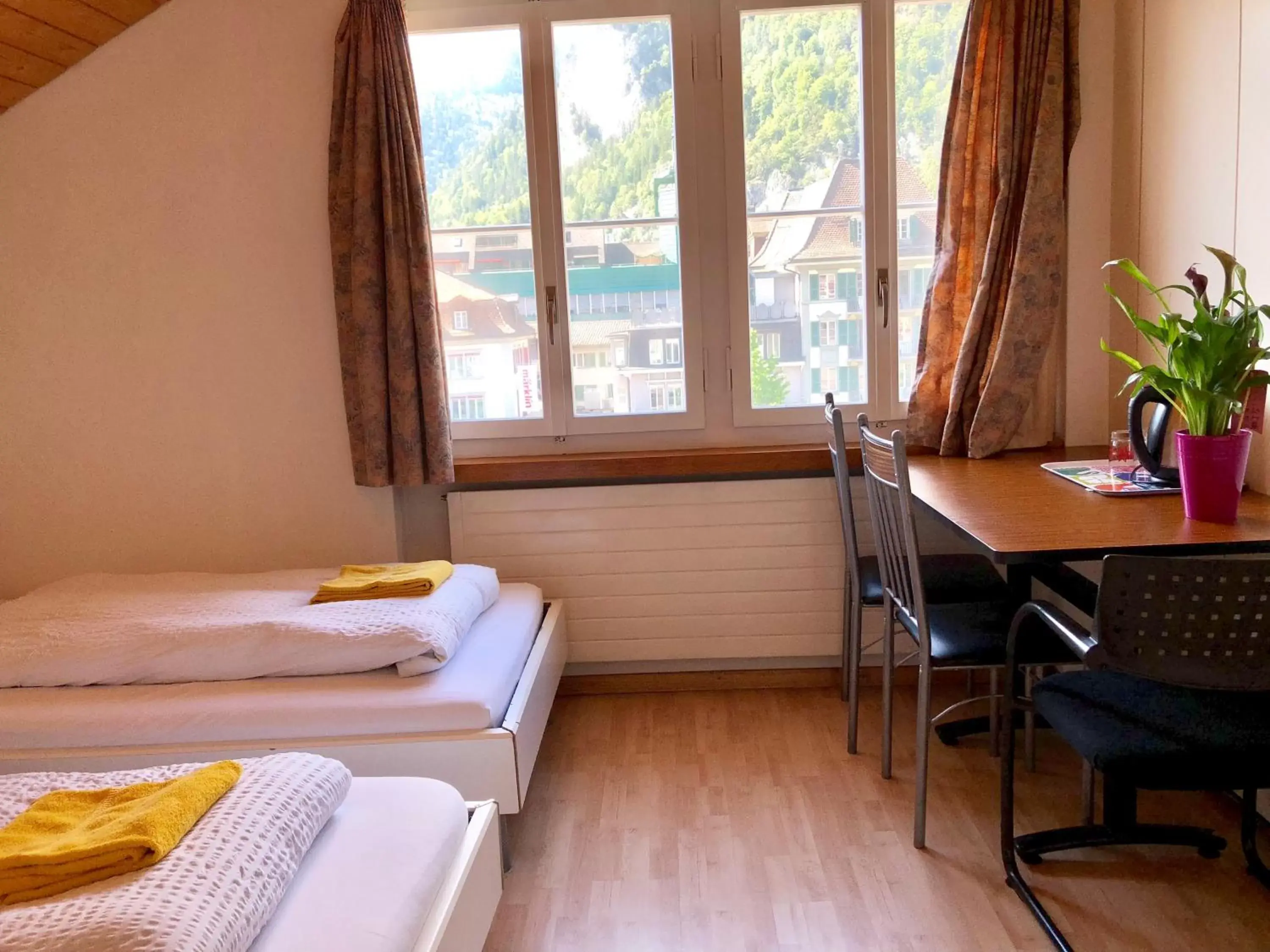 Triple Room with Shared Toilet in Interlaken Marco Hostel Triple Room with Shared Toilet in Interlaken Marco Hostel