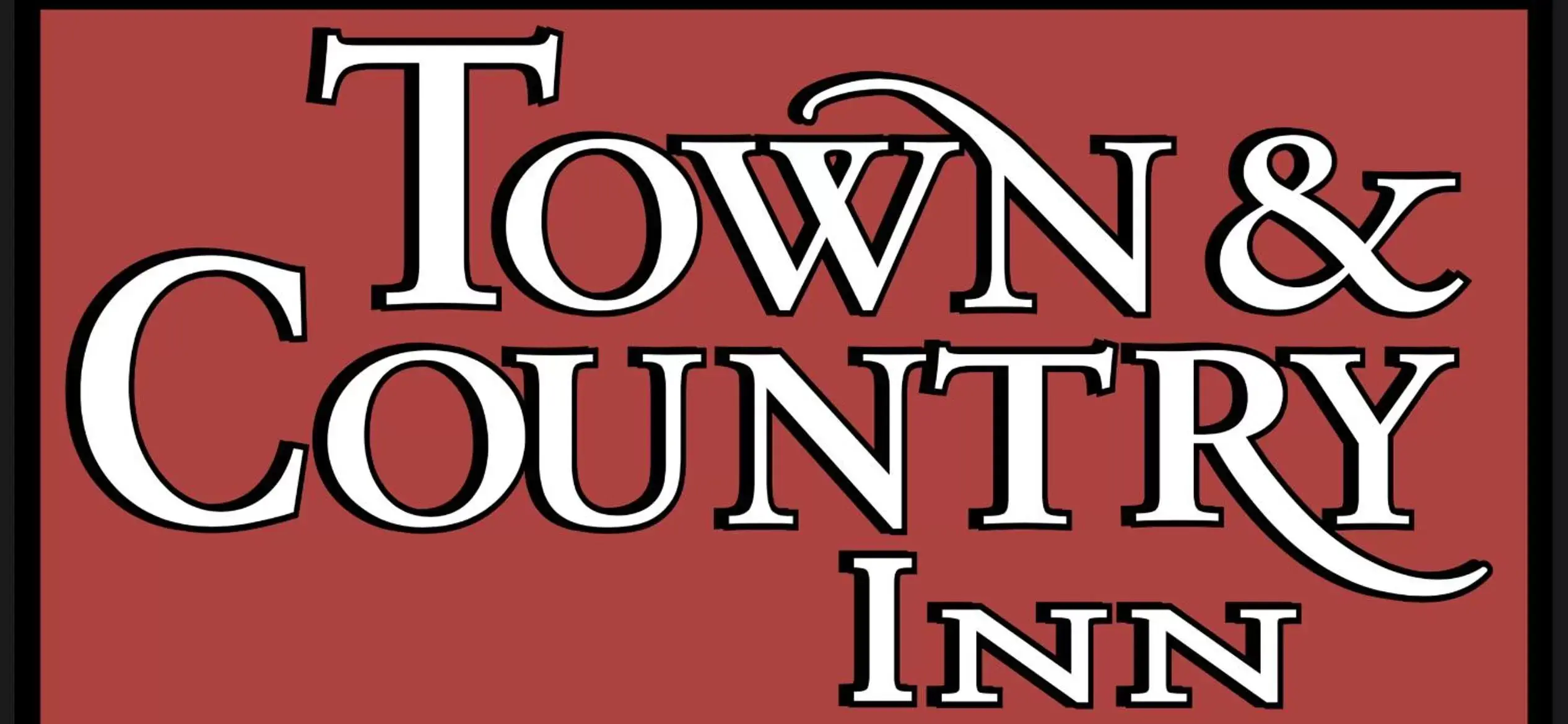 Property logo or sign in Town & Country Inn