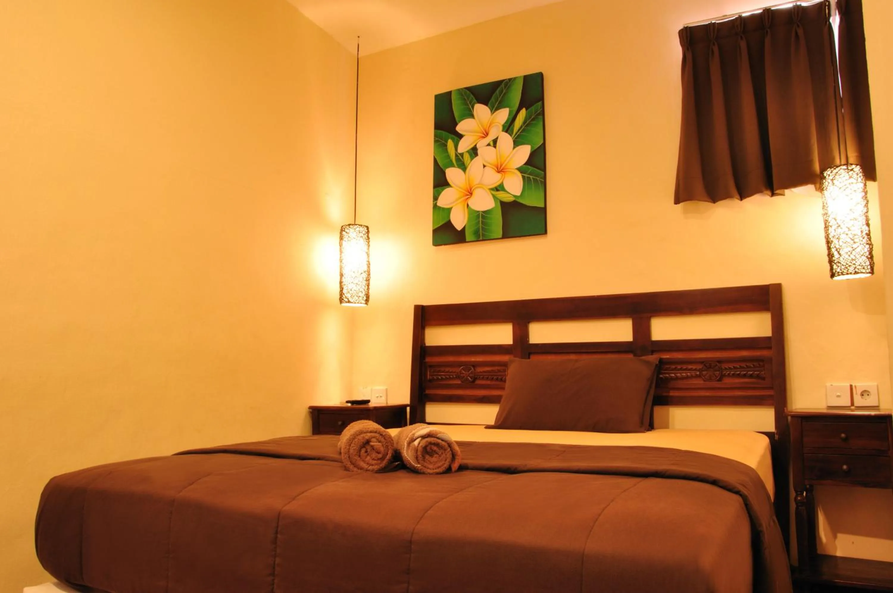Bed in Bemo Corner Guest House