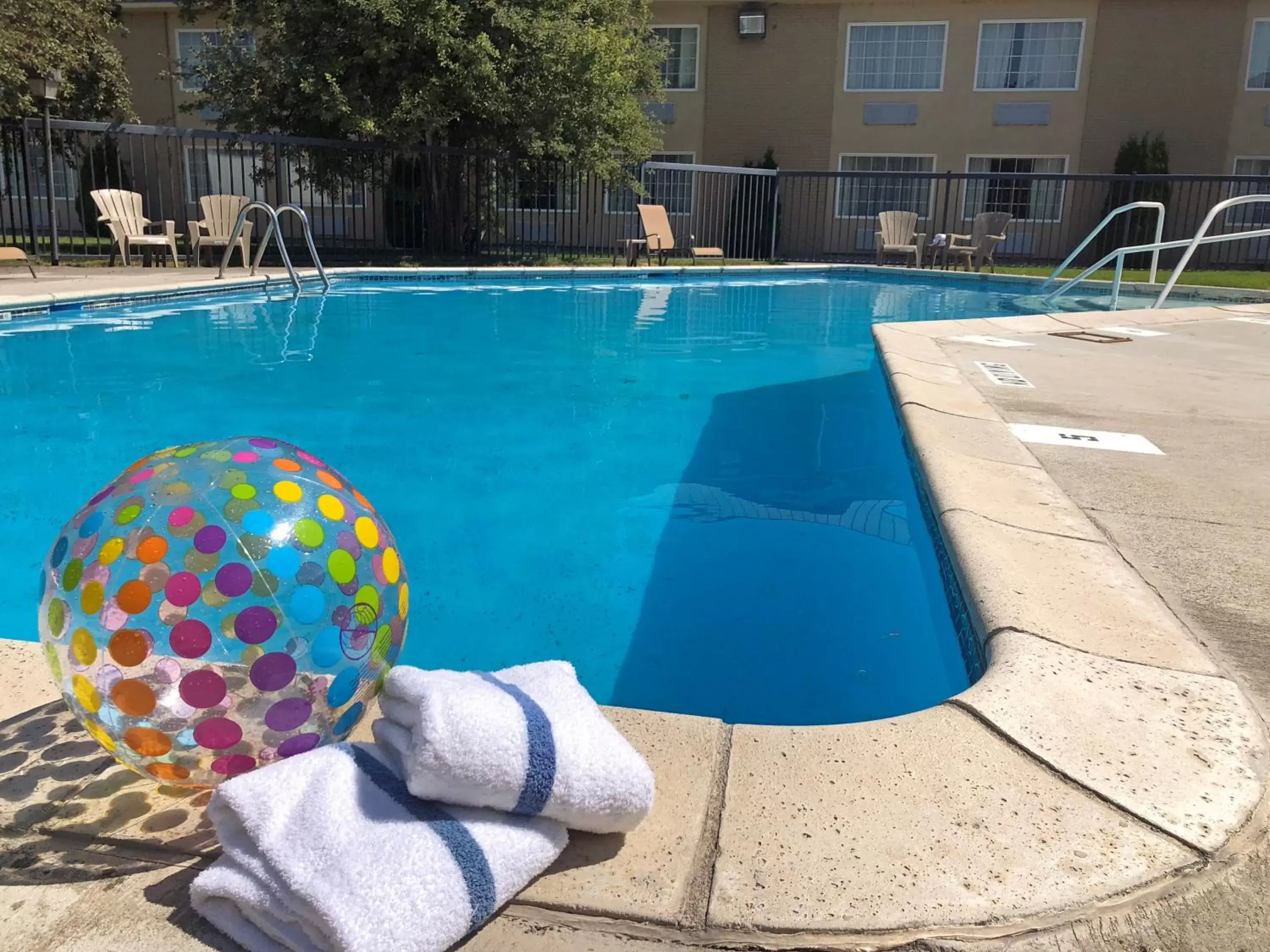 Swimming Pool in FairBridge Extended Stay, a Kitchenette Hotel