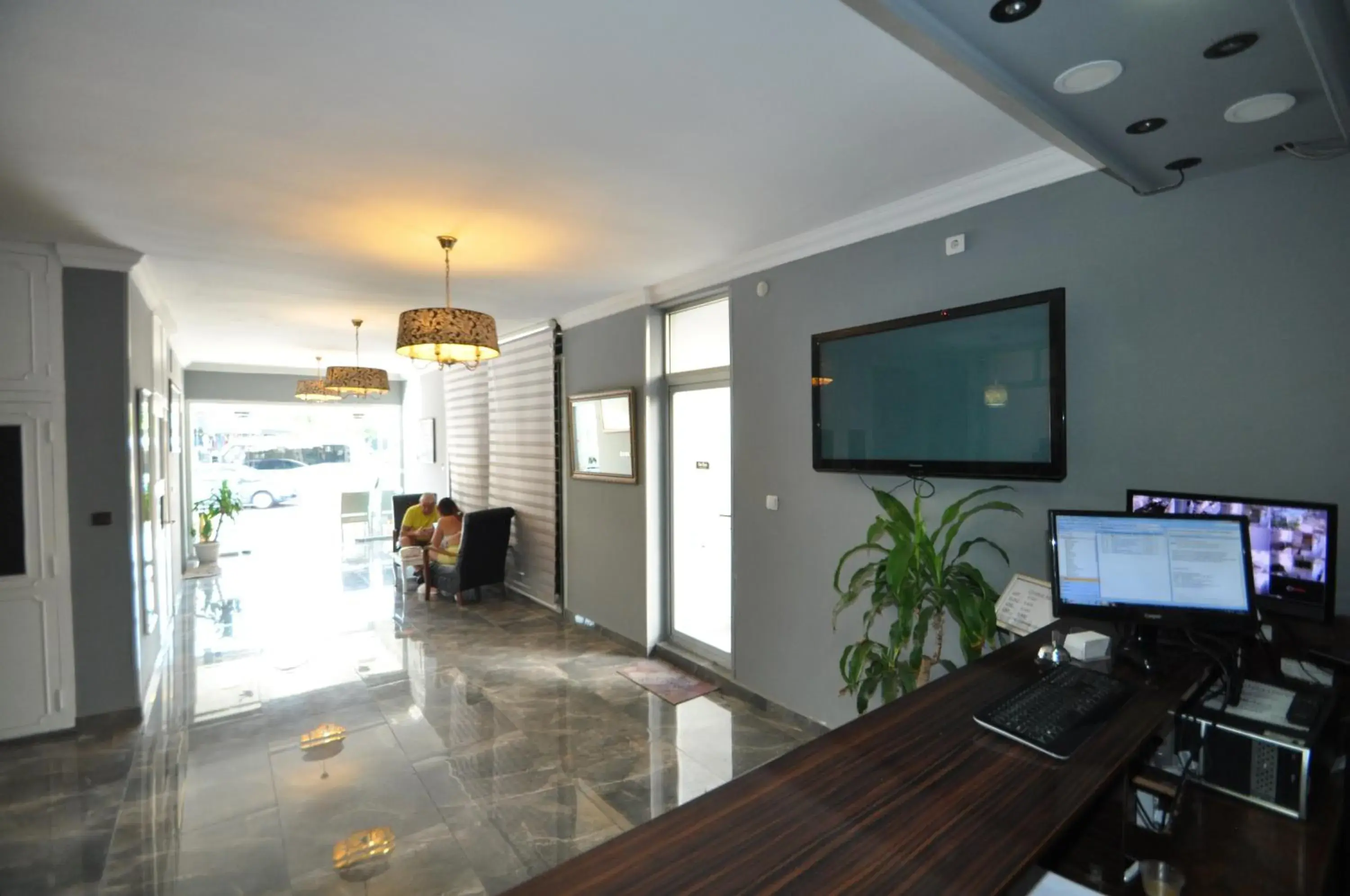 Lobby or reception, TV/Entertainment Center in Reis Maris Hotel