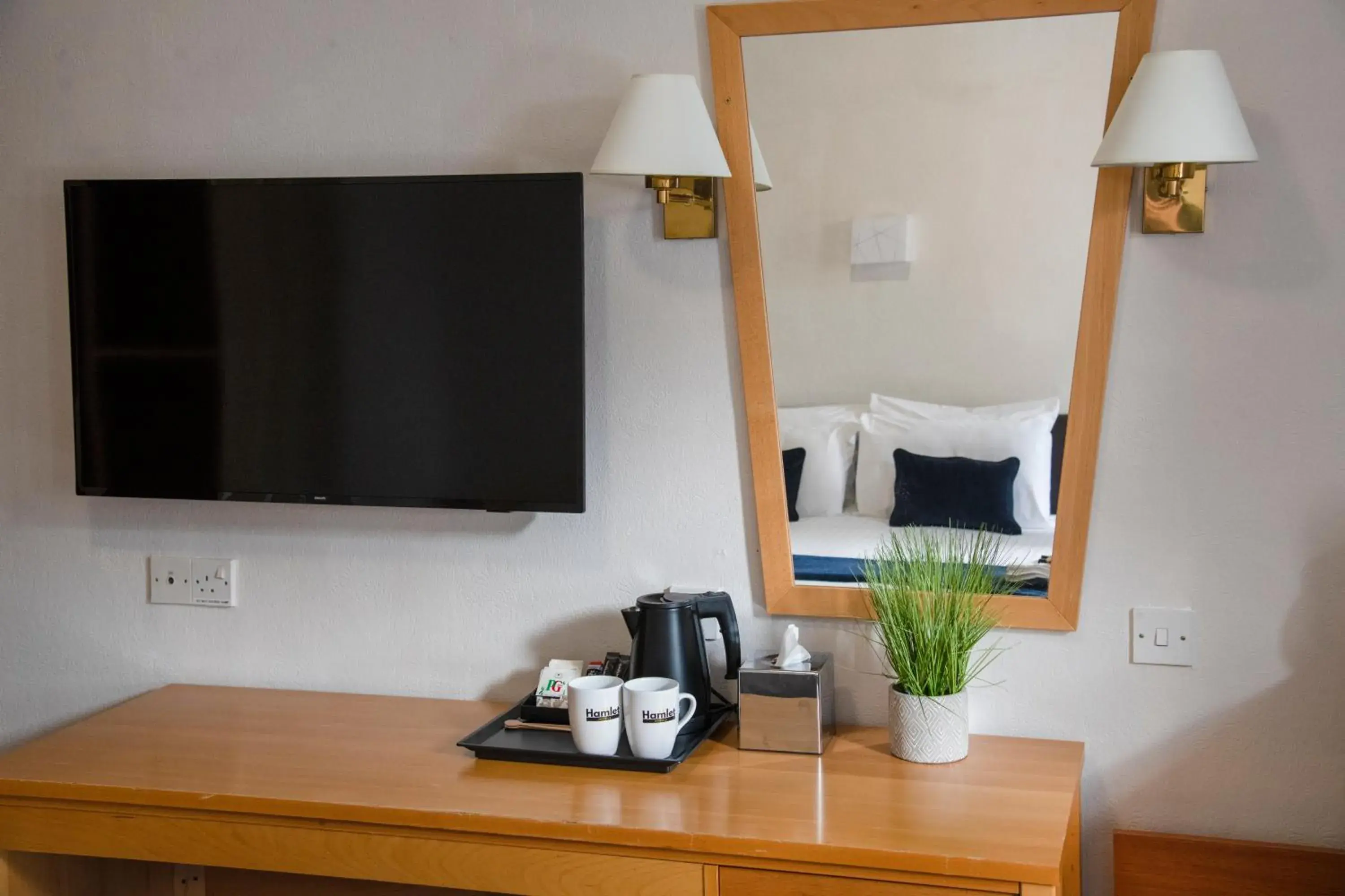 TV and multimedia, TV/Entertainment Center in Hamlet Hotels Maidstone