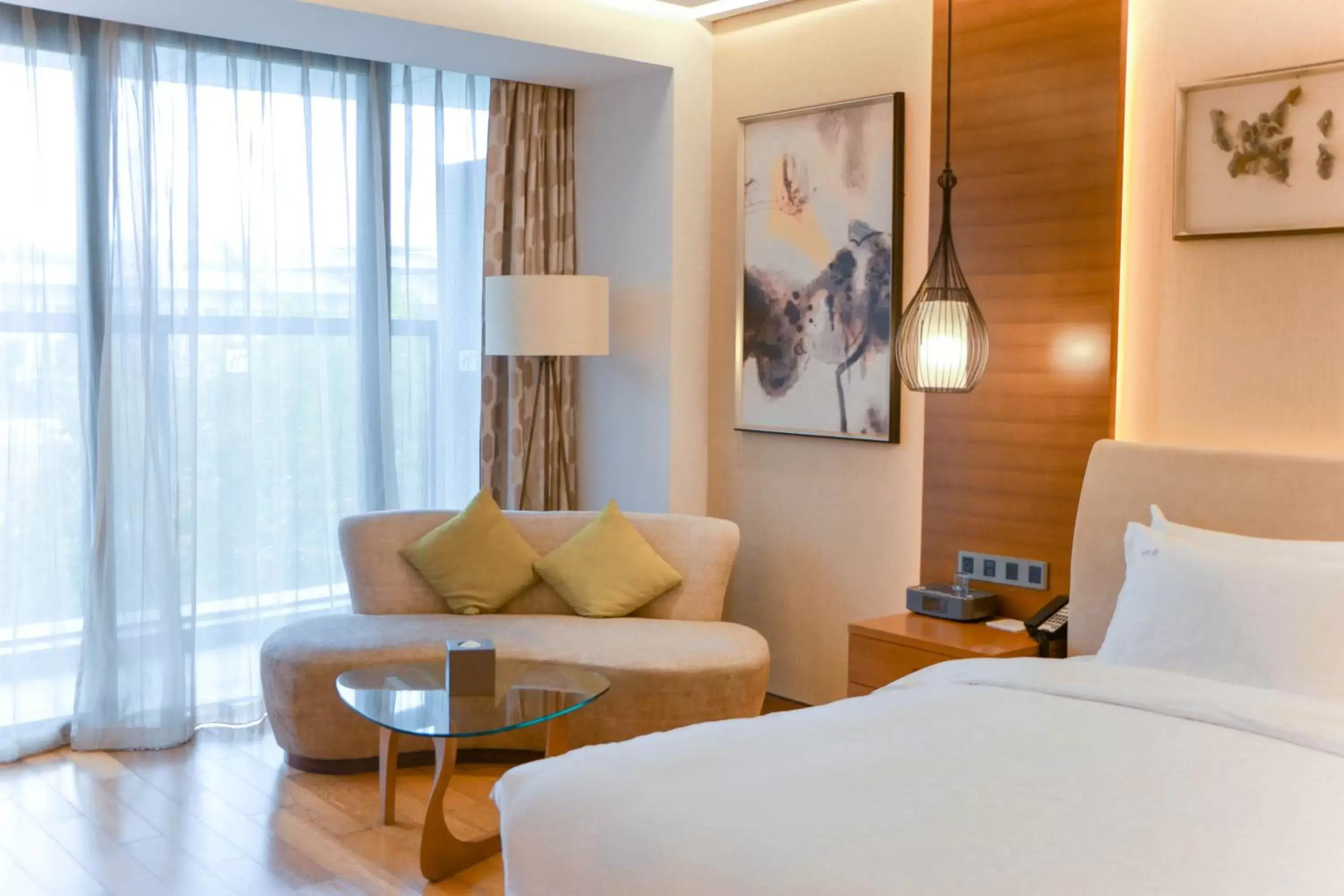 Living room, Bed in Holiday Inn Nanjing Xuanwu Lake by IHG Living room, Bed in Holiday Inn Nanjing Xuanwu Lake by IHG