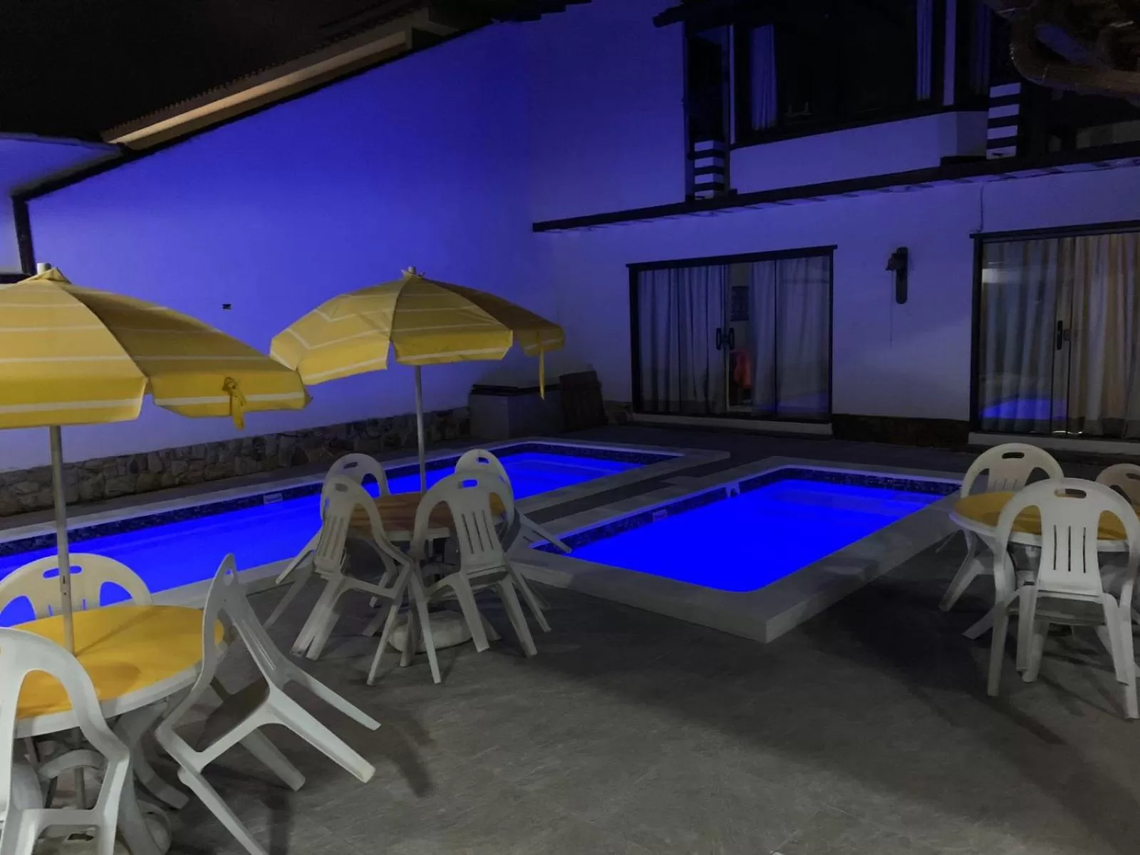 Swimming pool in Pousada Fazendinha Unamar