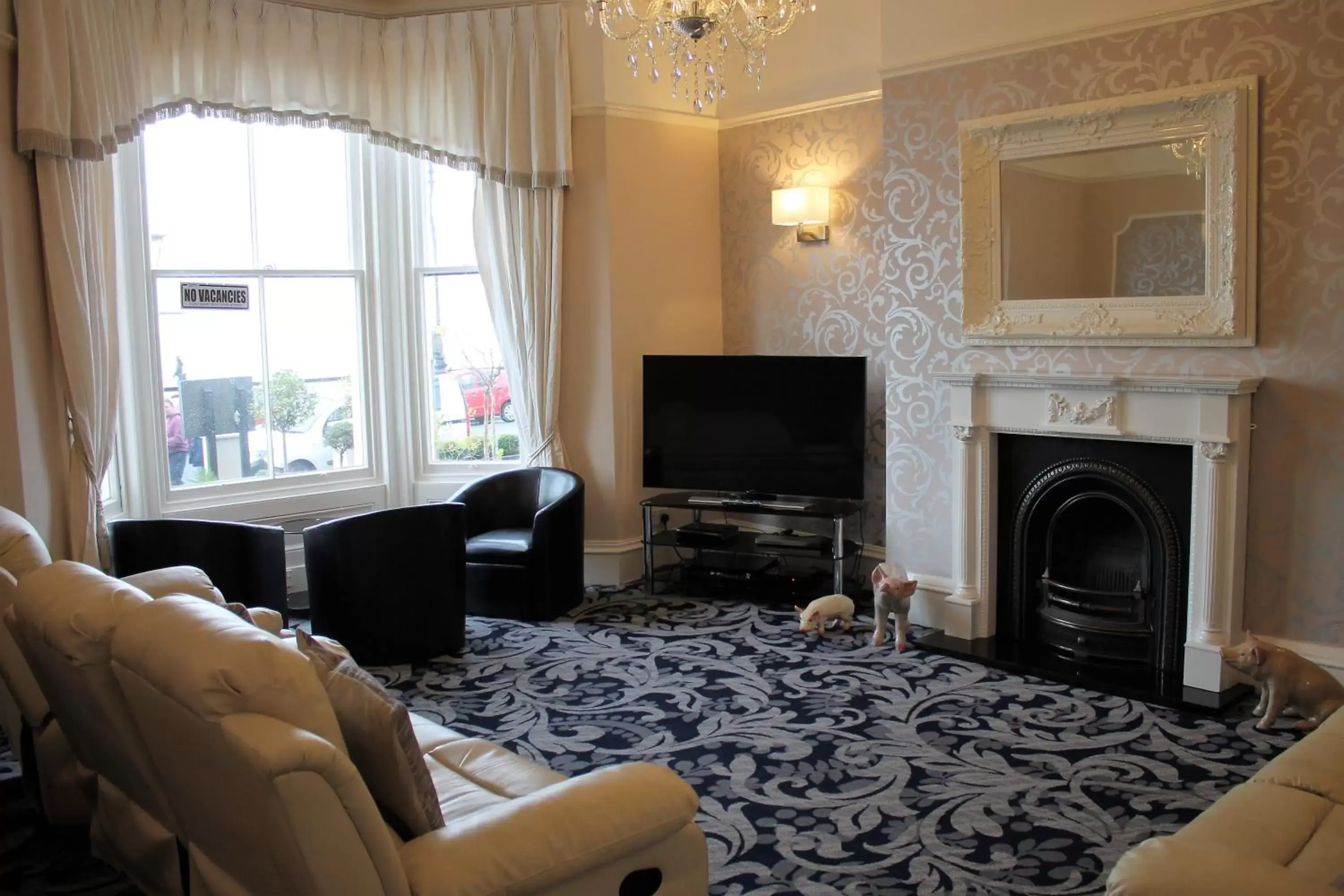 Communal lounge/ TV room, Seating Area in Winchmore Hotel