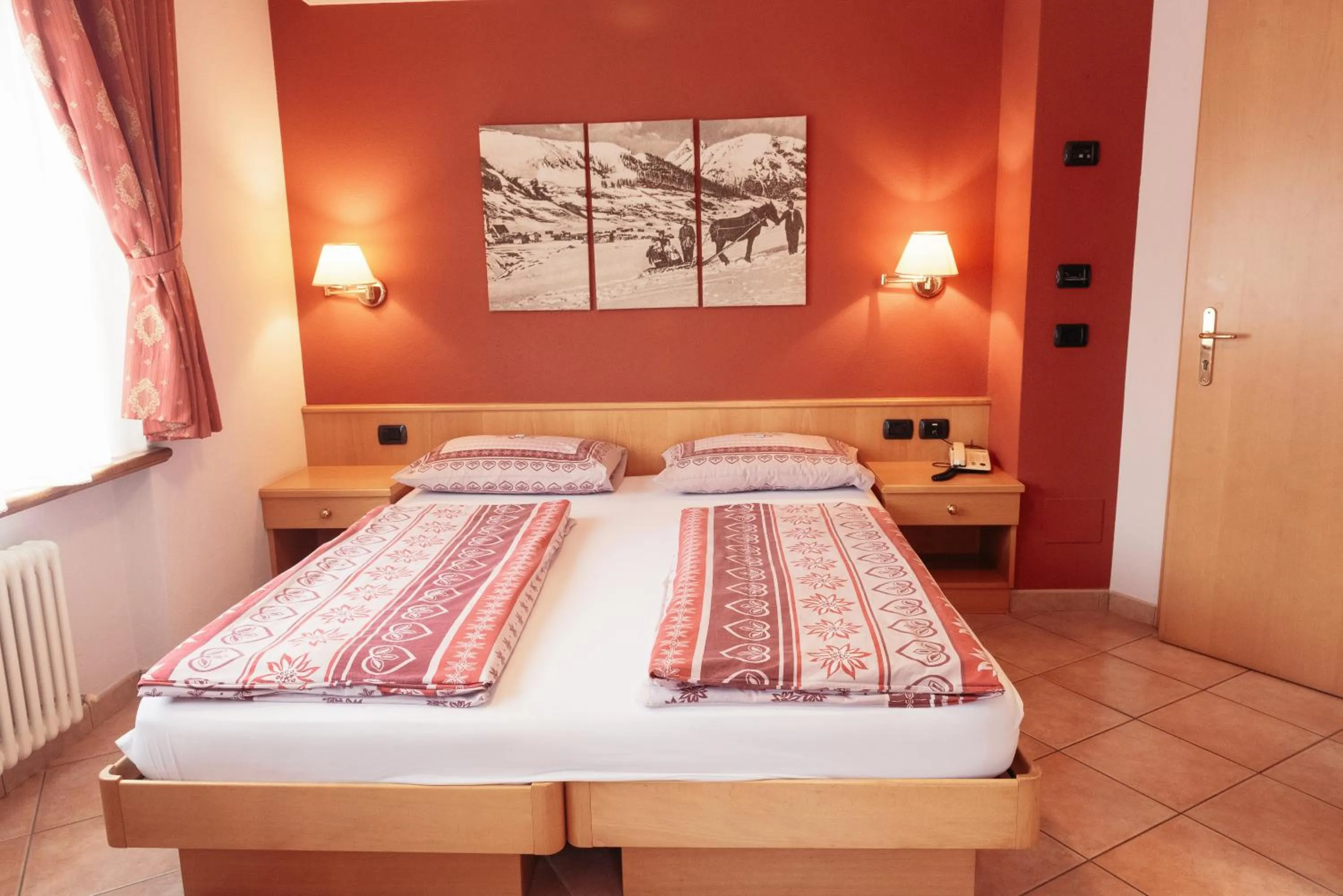 Bed in Hotel Garni Rin Da Rin