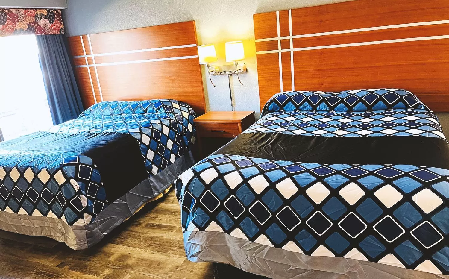 Bed in Coratel Inn & Suites by Jasper Waite Park