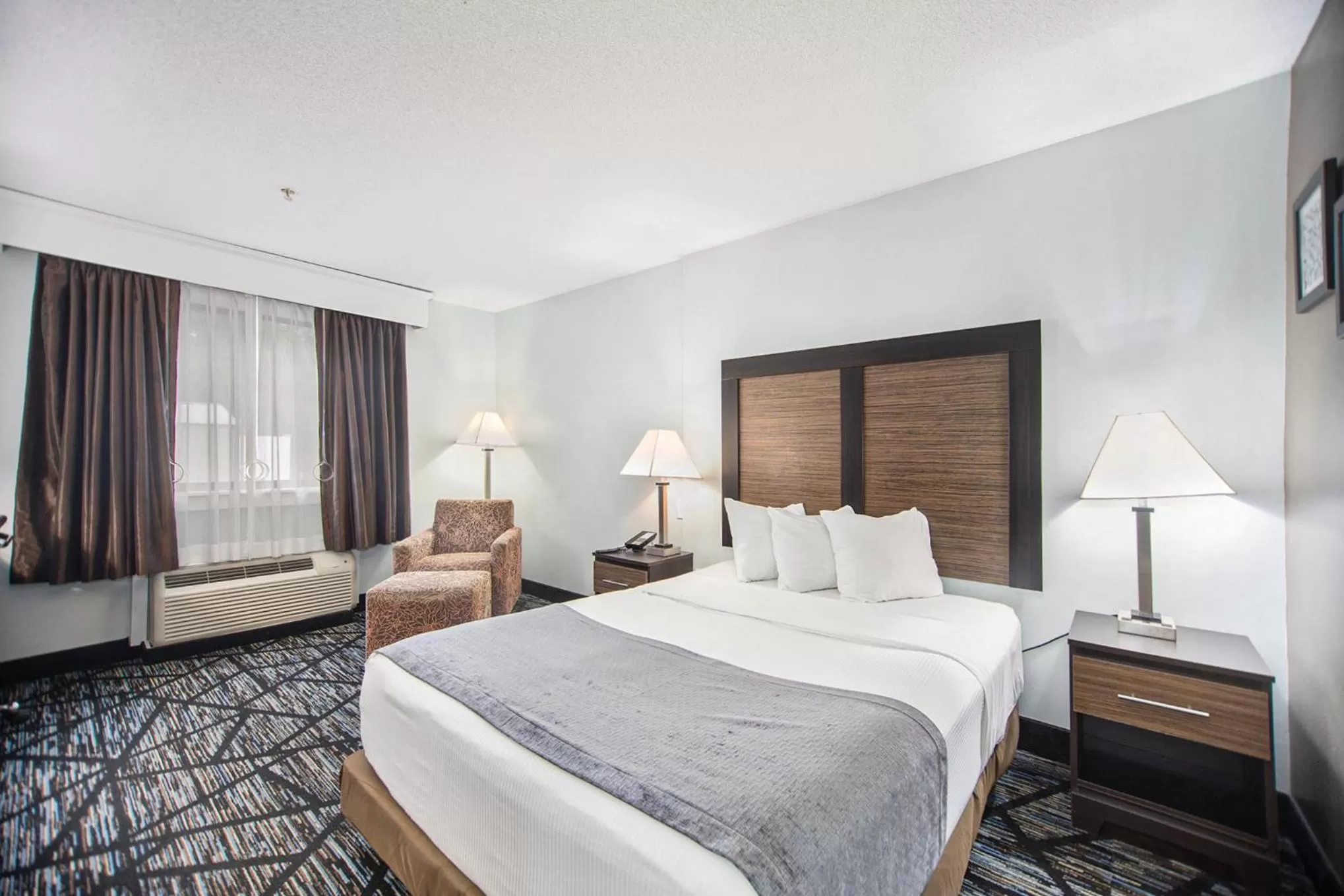 Bed in Baymont by Wyndham Grand Haven