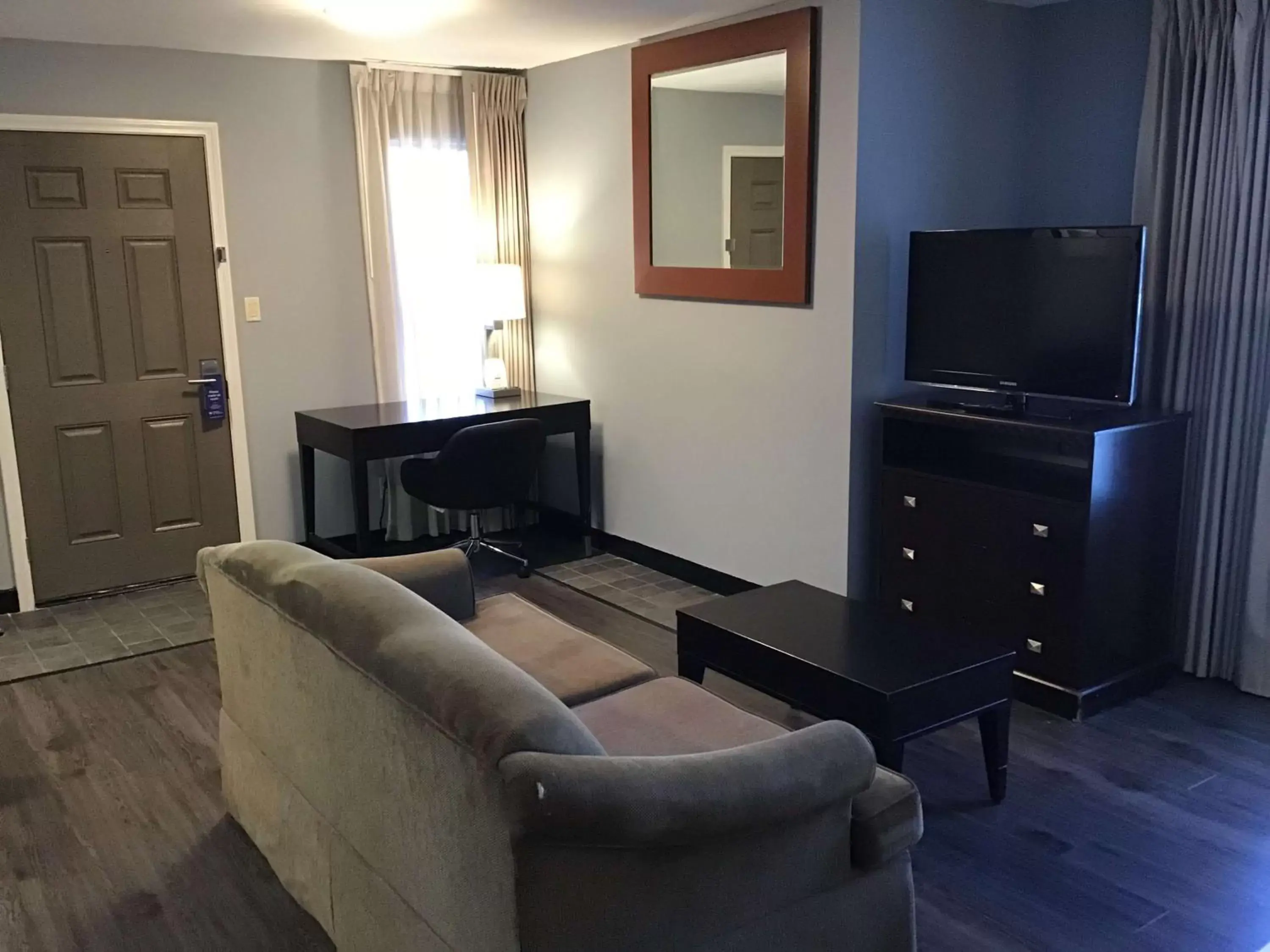TV and multimedia, TV/Entertainment Center in SureStay Studio by Best Western Pensacola
