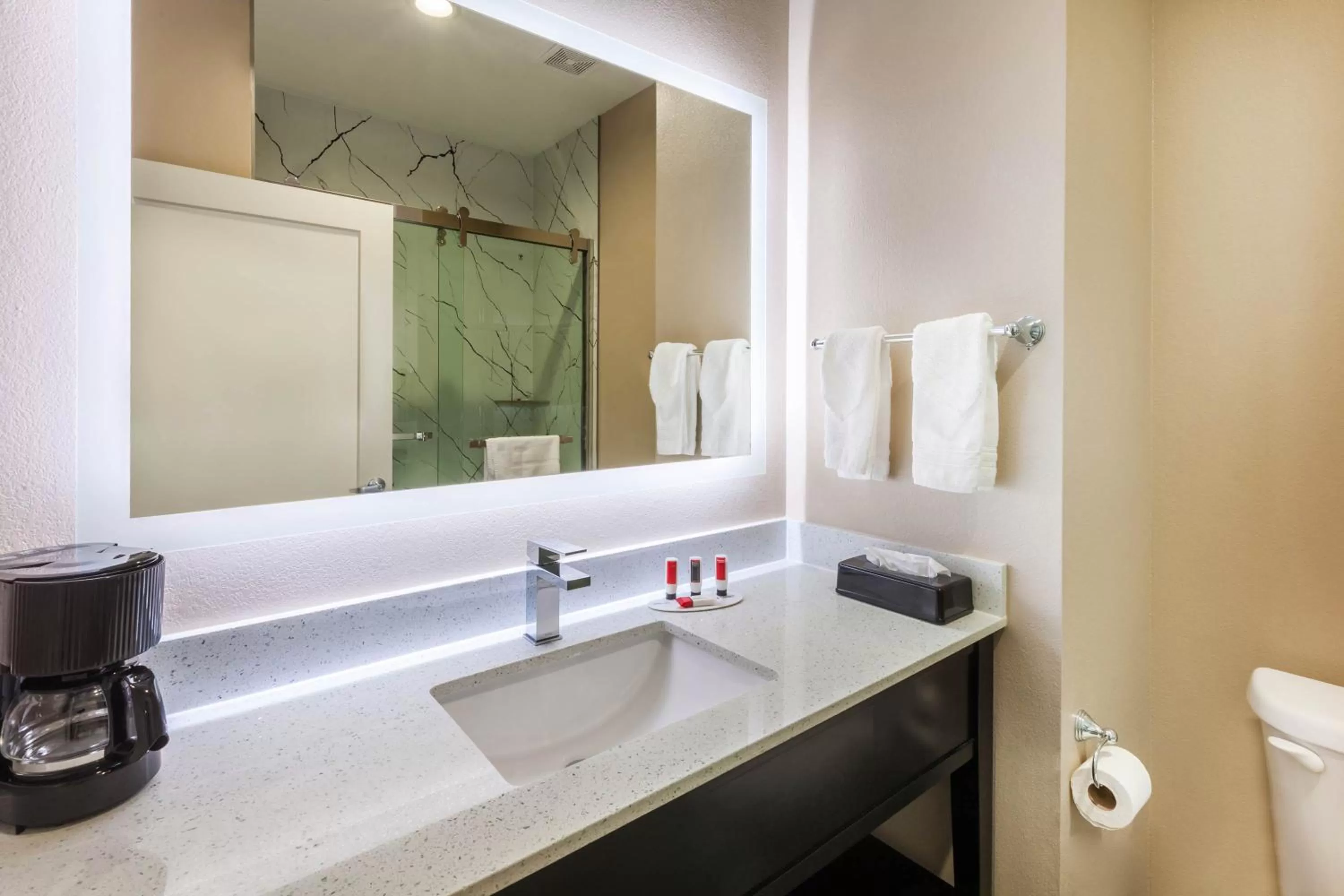 Bathroom in Super 8 by Wyndham Kingwood Houston North