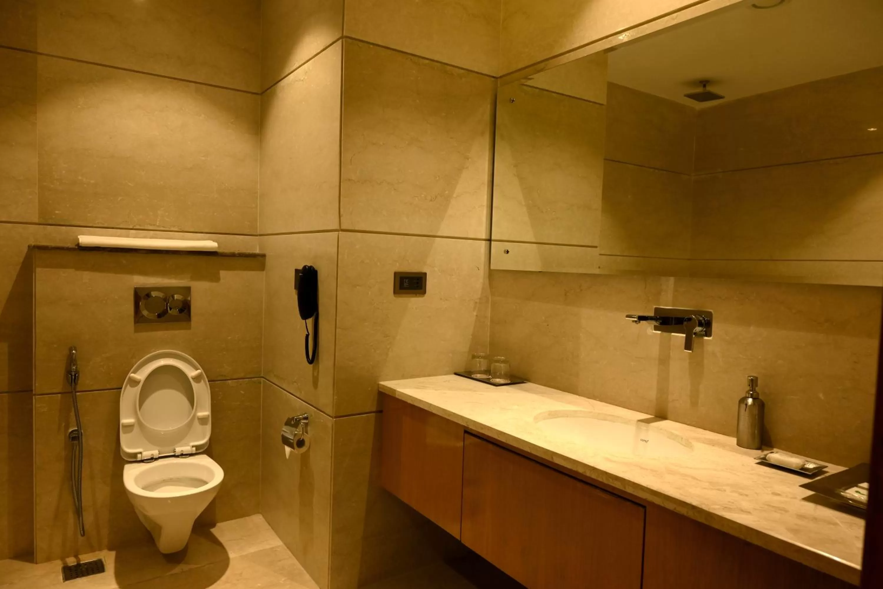 Bathroom in Ramada Plaza by Wyndham Jammu Vijaypur