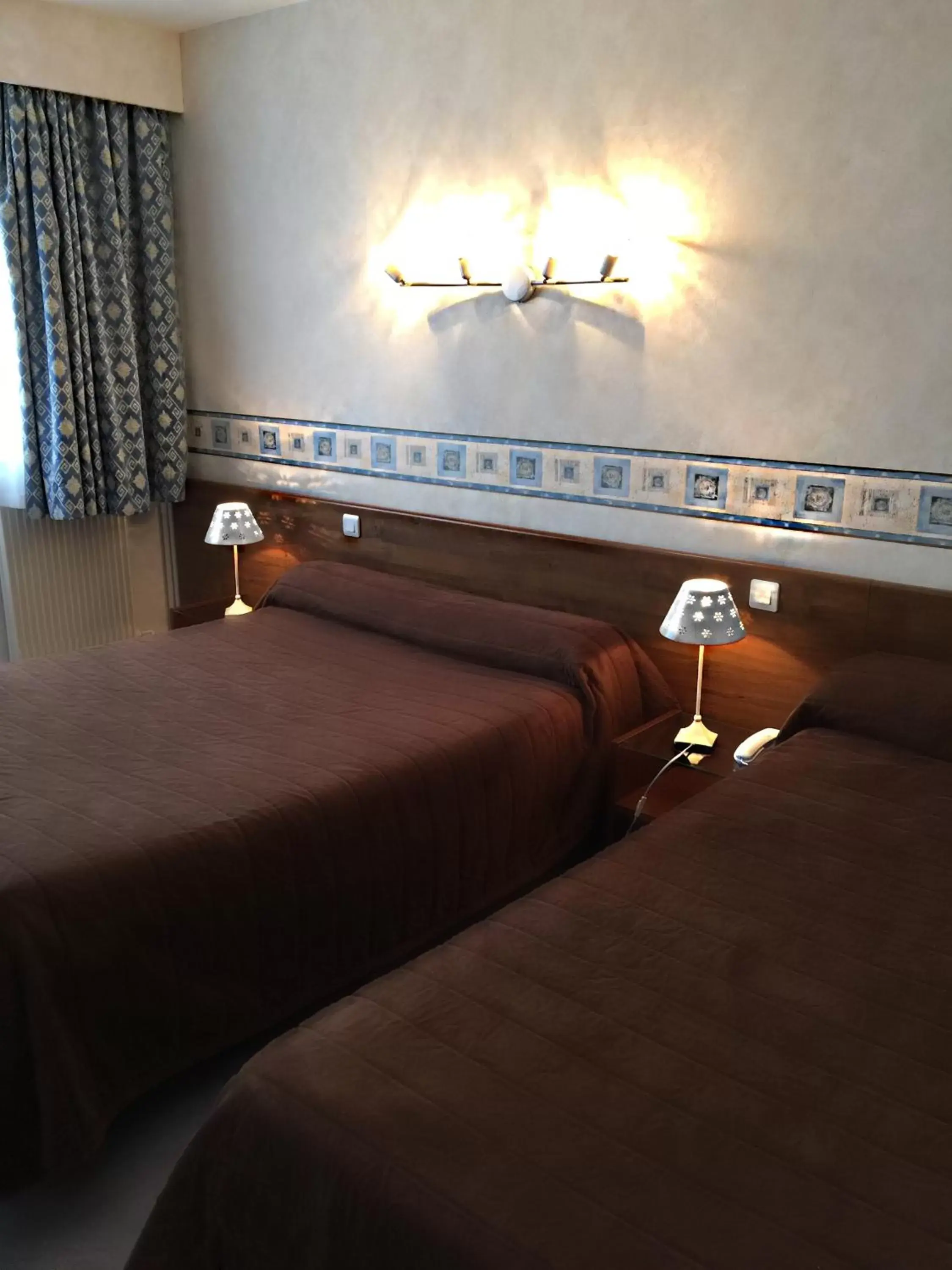 Bed in Hotel Saint-Aignan