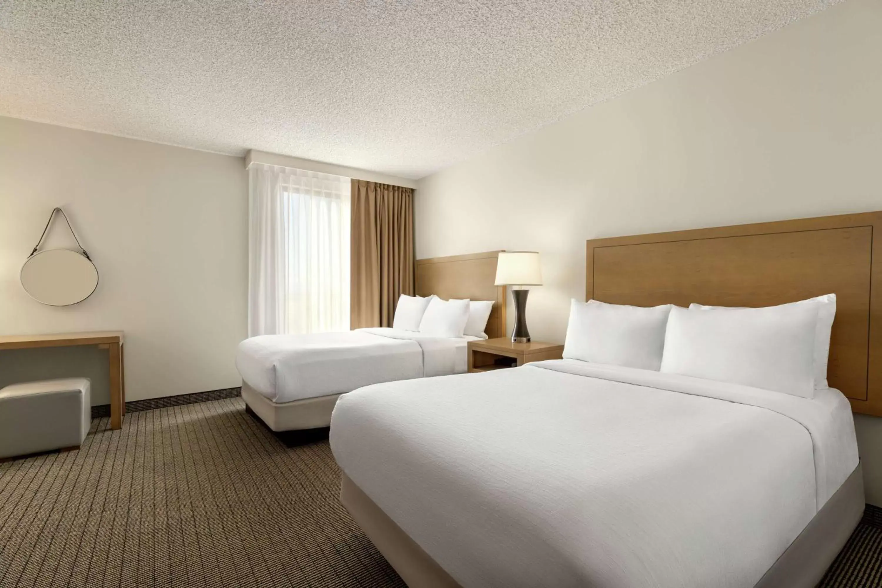 Bed in Embassy Suites by Hilton Denver International Airport