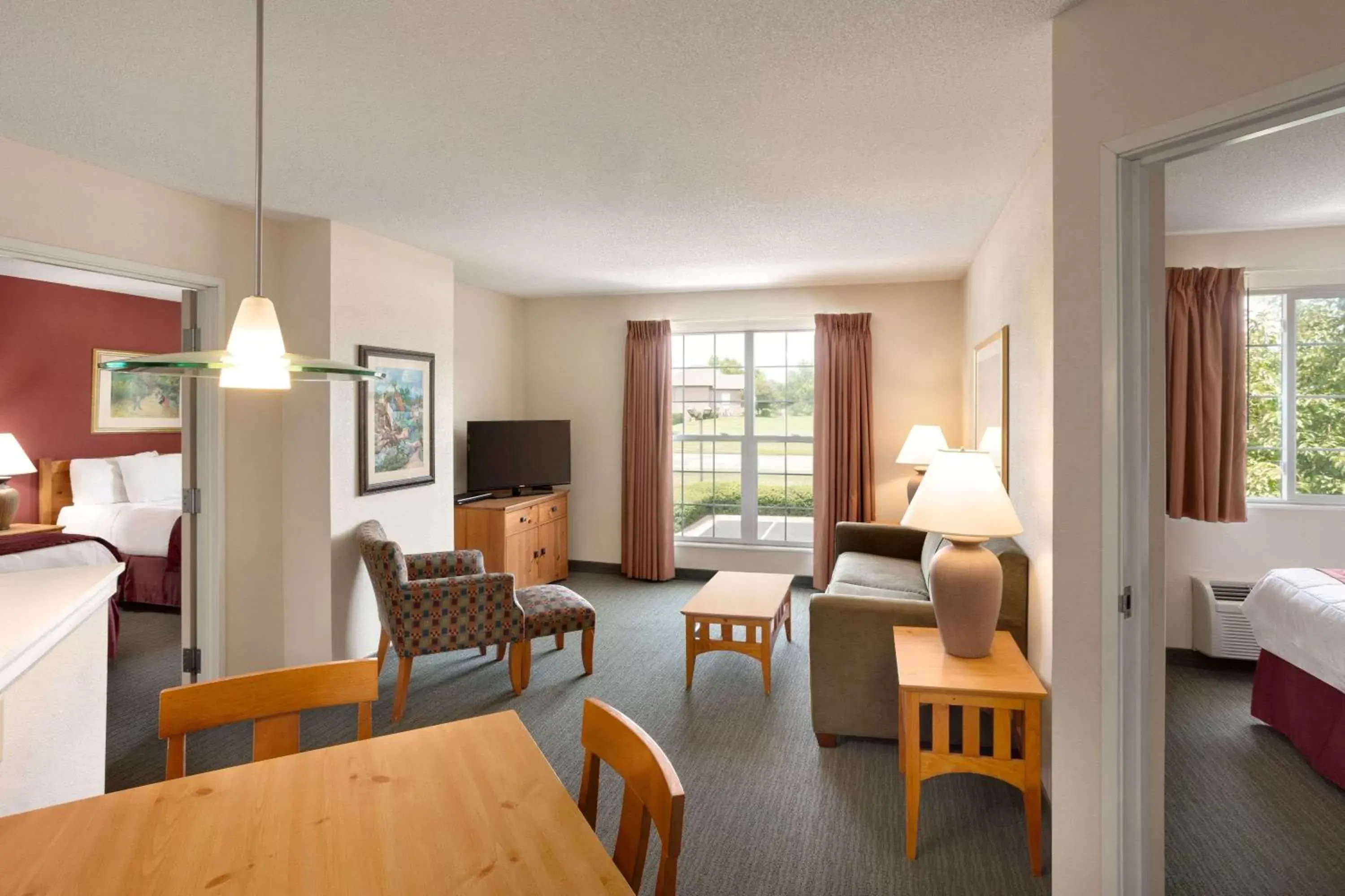 Photo of the whole room, Seating Area in Baymont by Wyndham Wichita East