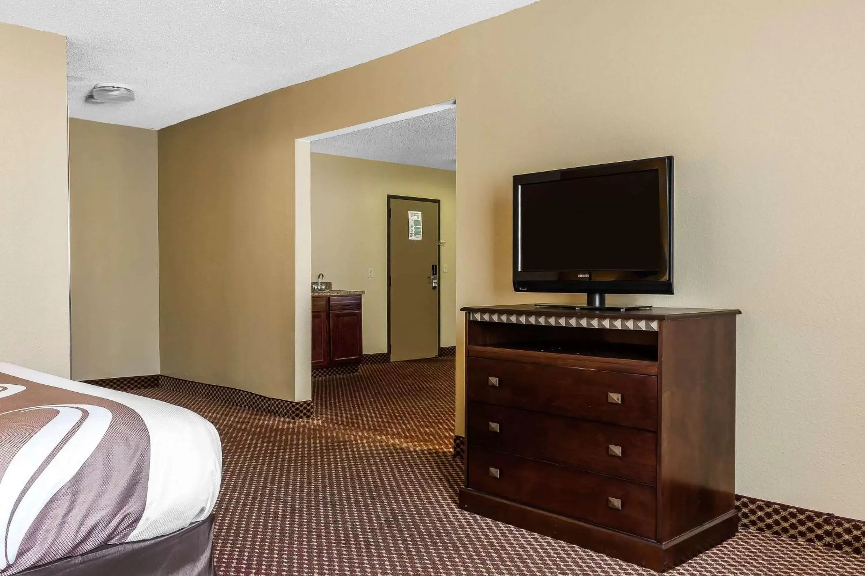 Photo of the whole room, TV/Entertainment Center in Quality Inn & Suites Bloomington University Area