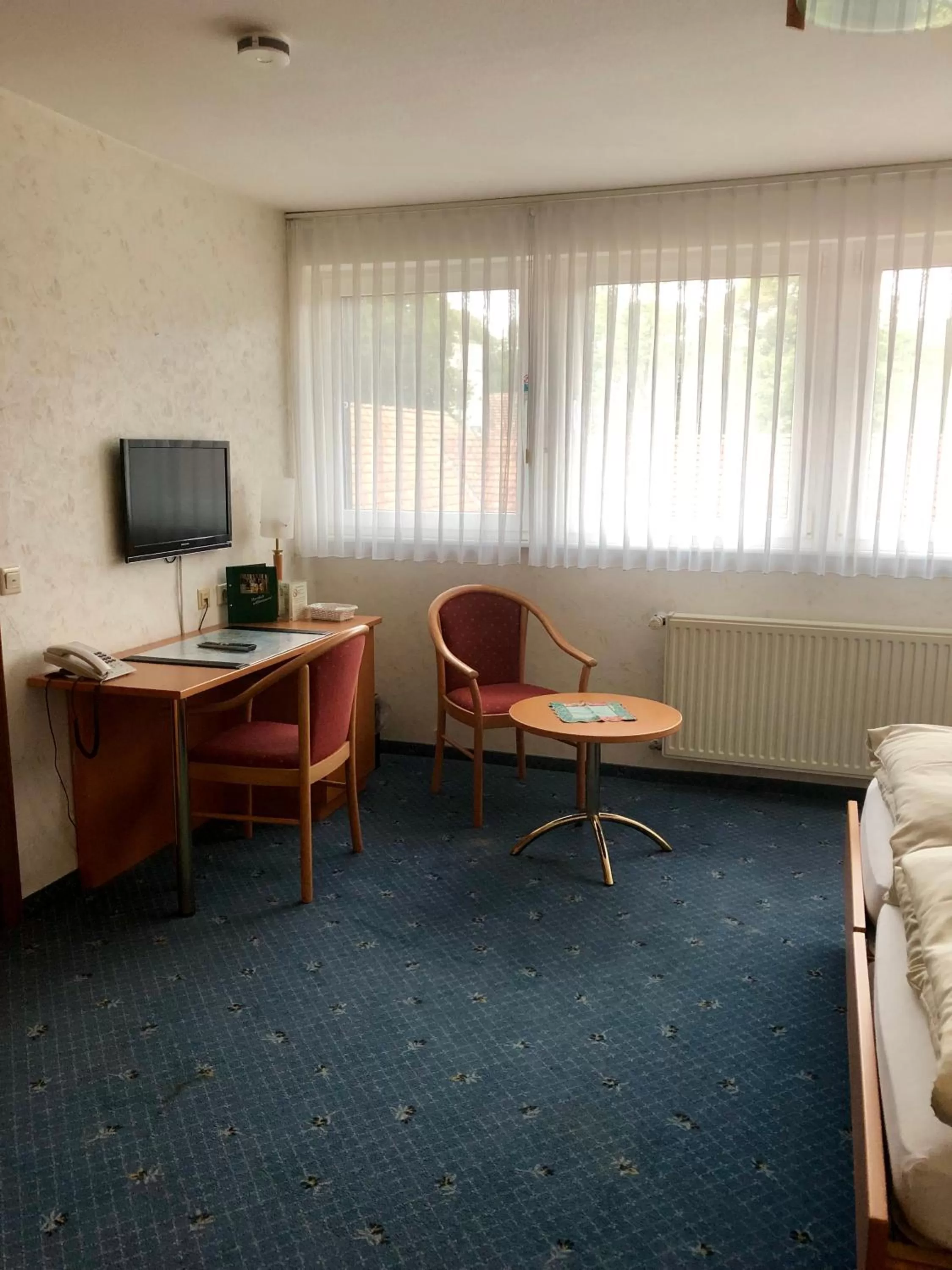 Seating area in Gasthof Waldesruh