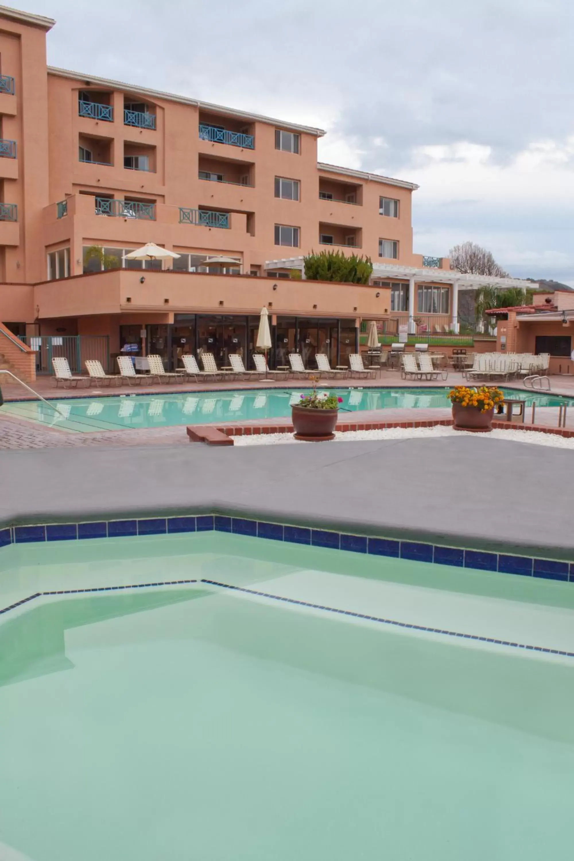 Swimming pool, Property Building in San Luis Bay Inn