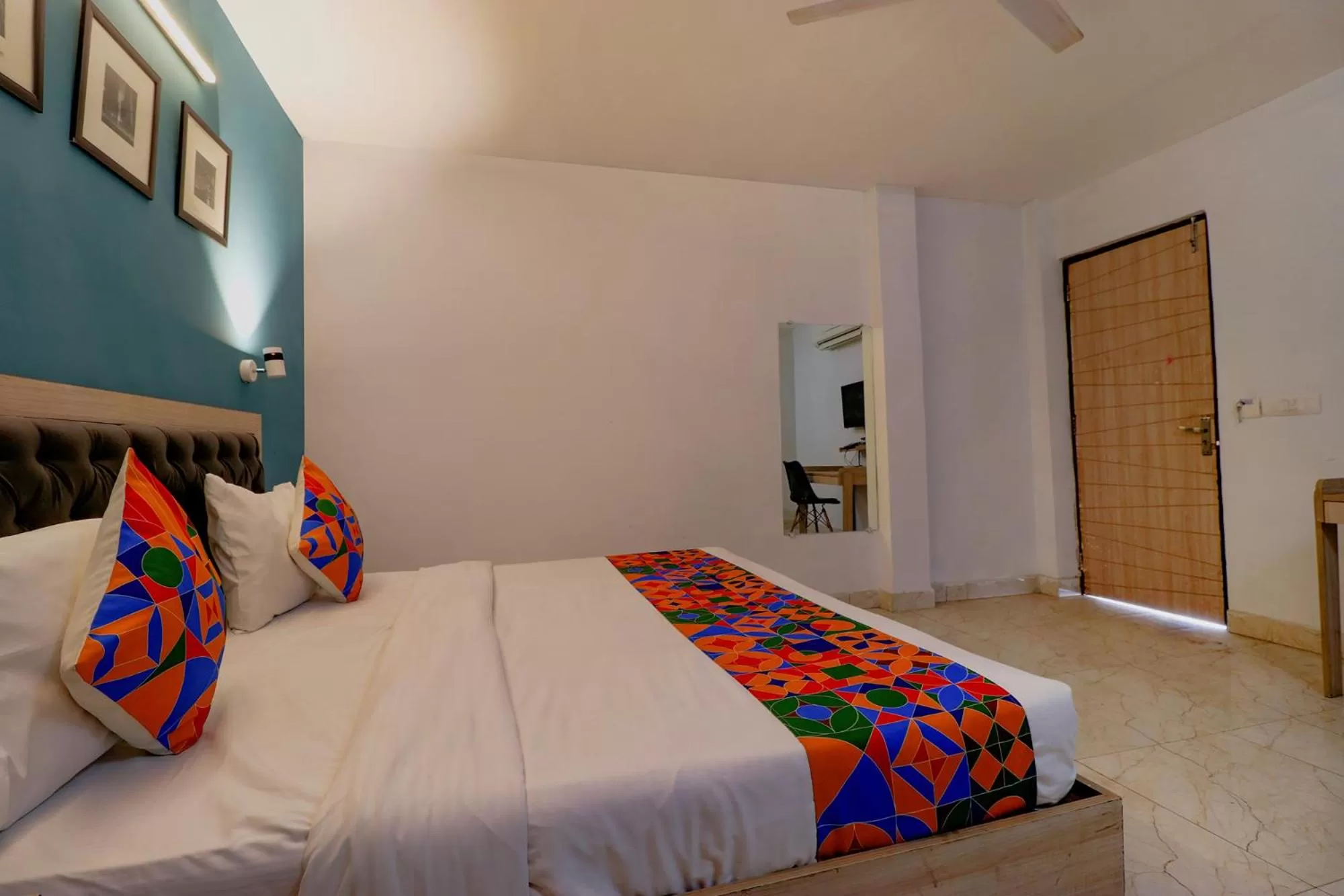 Bed in FabHotel Happy Inn