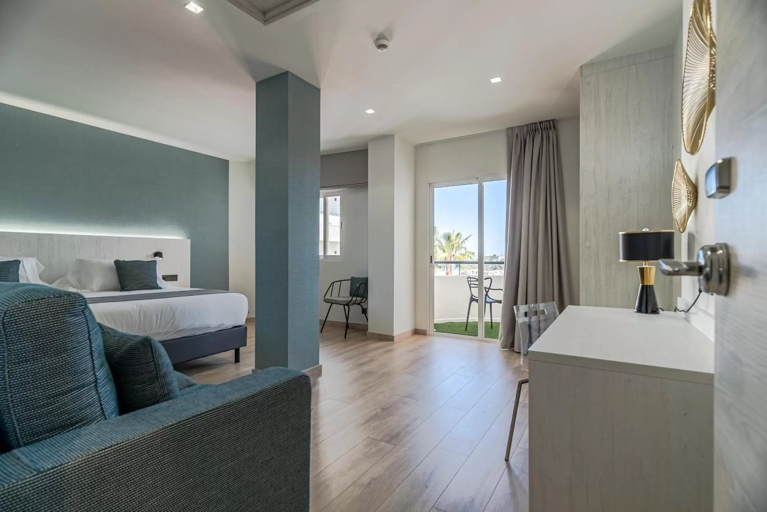 Bed, Seating Area in Ramada Resort by Wyndham Puerto de Mazarron
