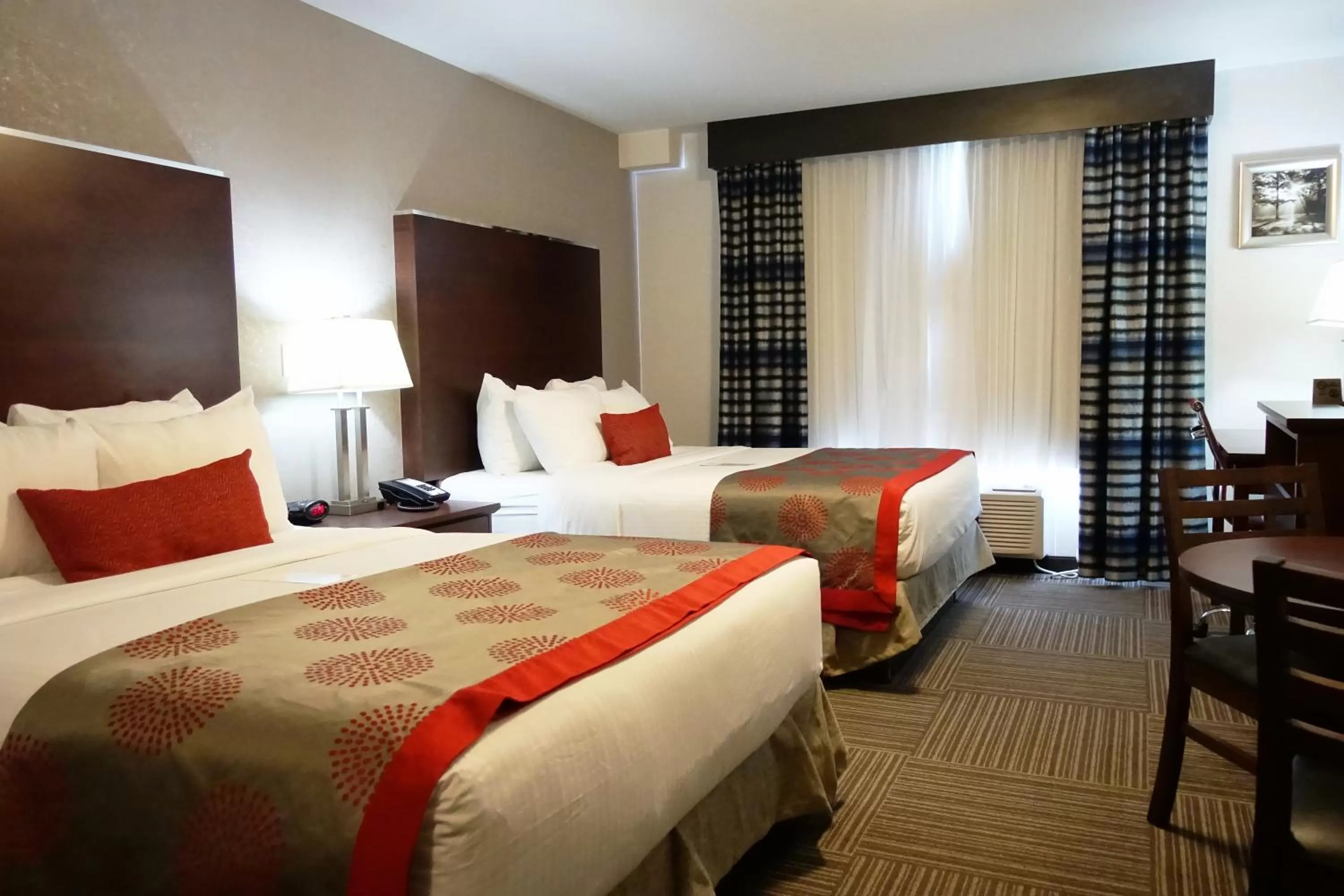 Photo of the whole room, Bed in Ramada by Wyndham Moose Jaw