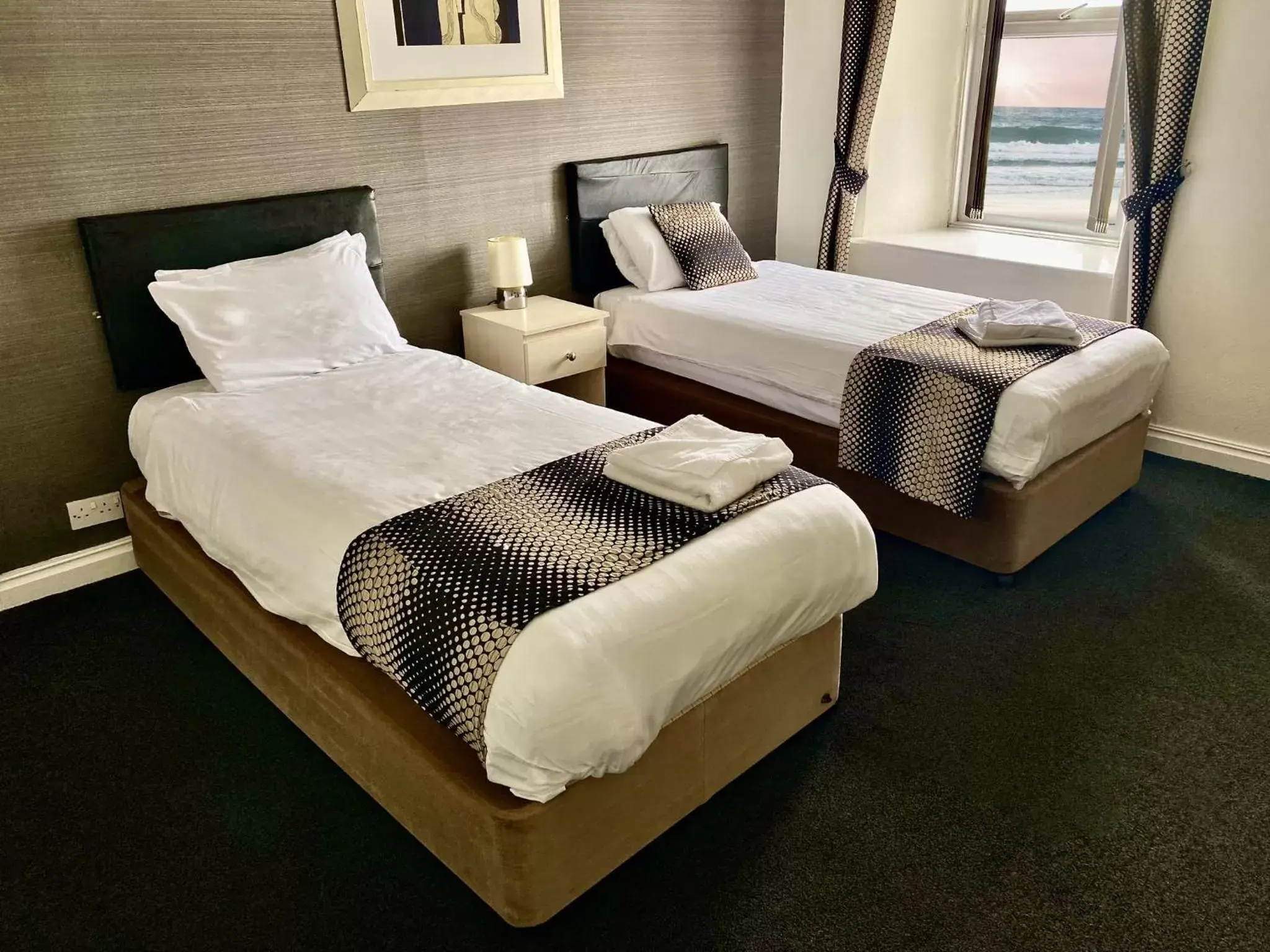 Bed in Royal Seabank Hotel