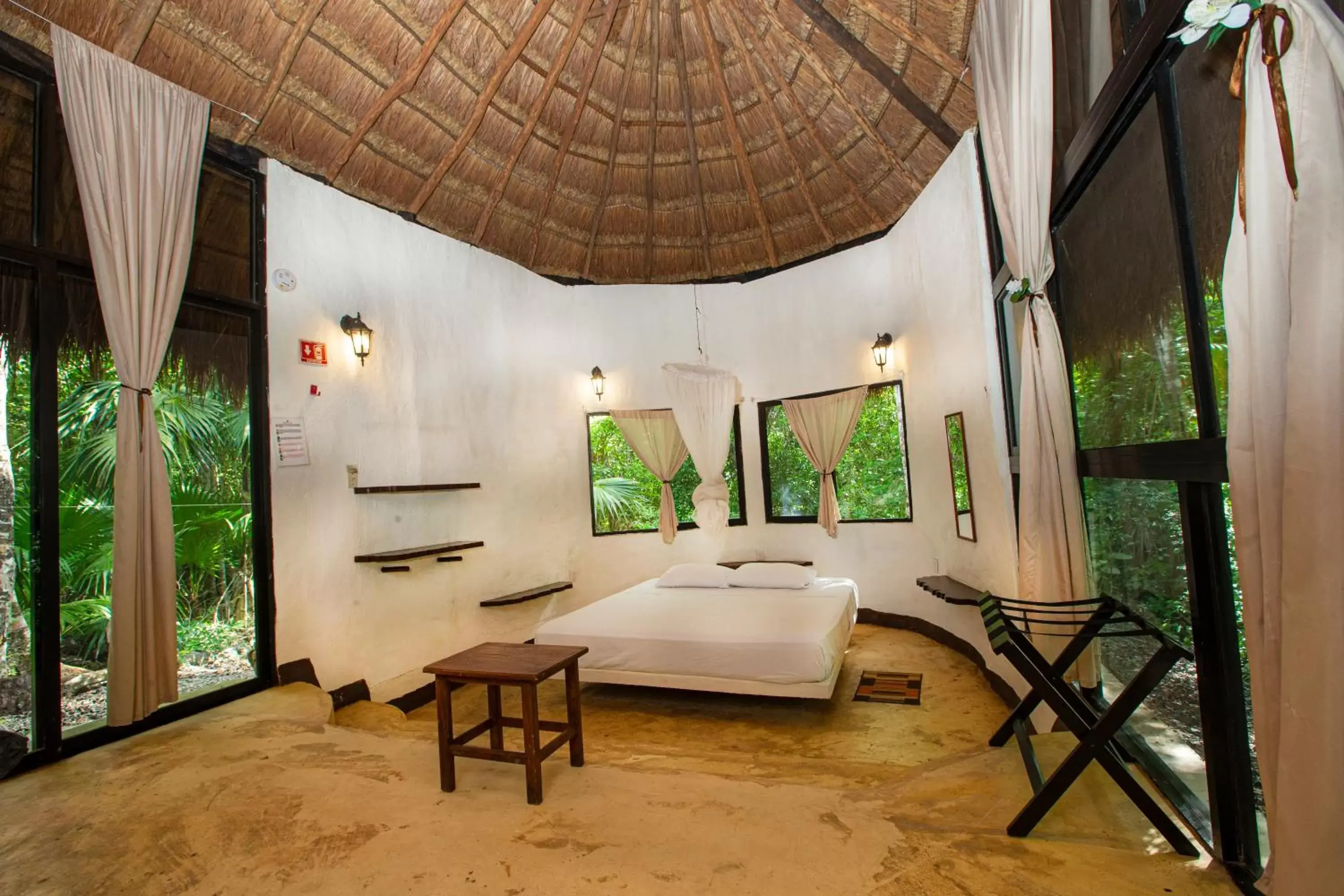 Bed, Seating Area in Jolie Jungle Eco Hotel