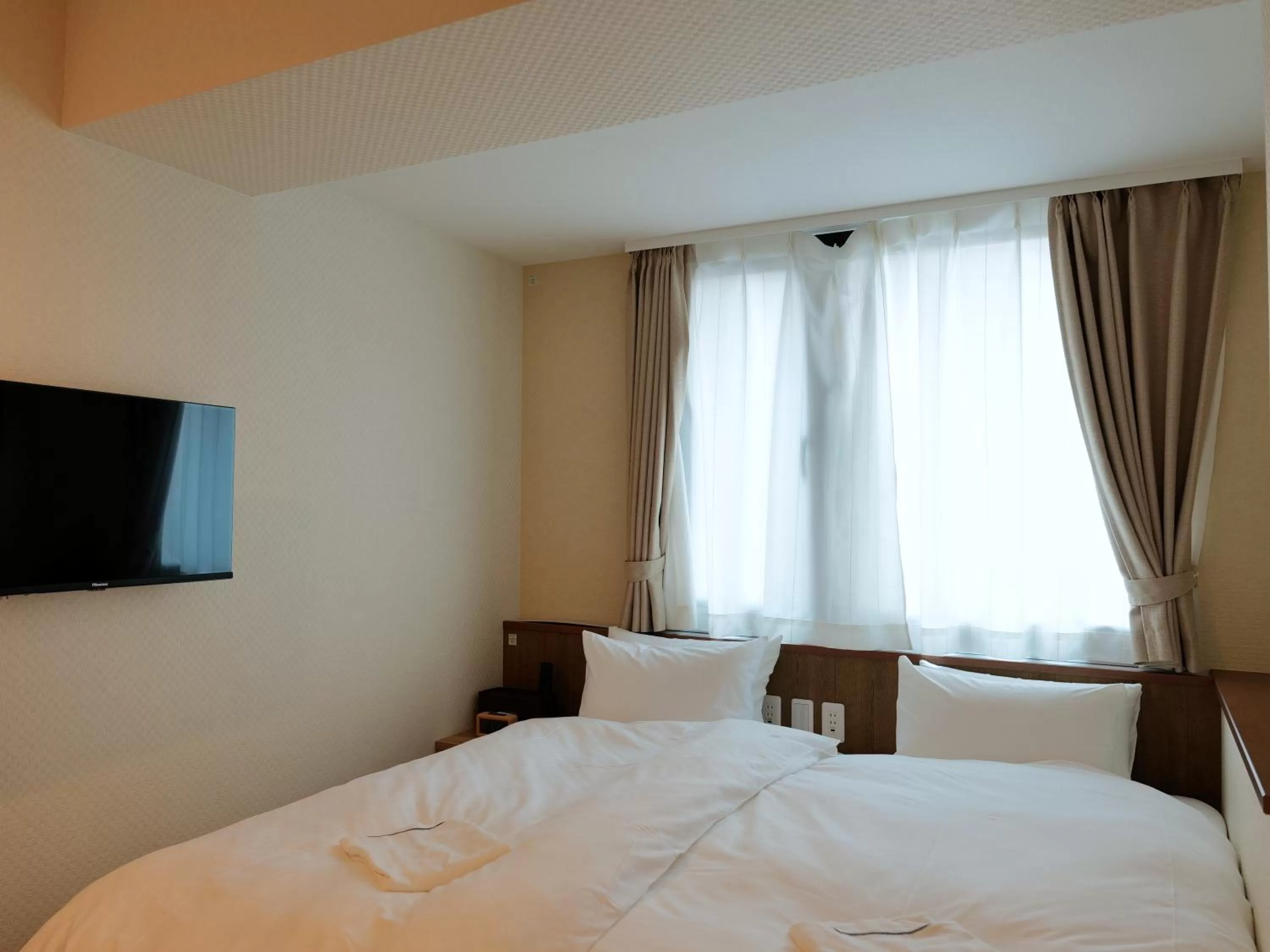 Bed in Waka Kyoto Kawaramachi Hotel