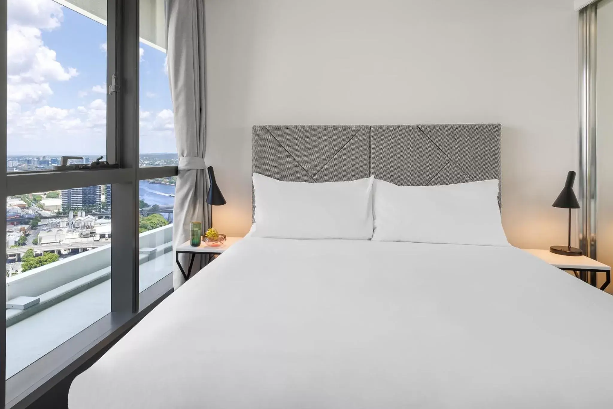 Bed in Meriton Suites Herschel Street, Brisbane