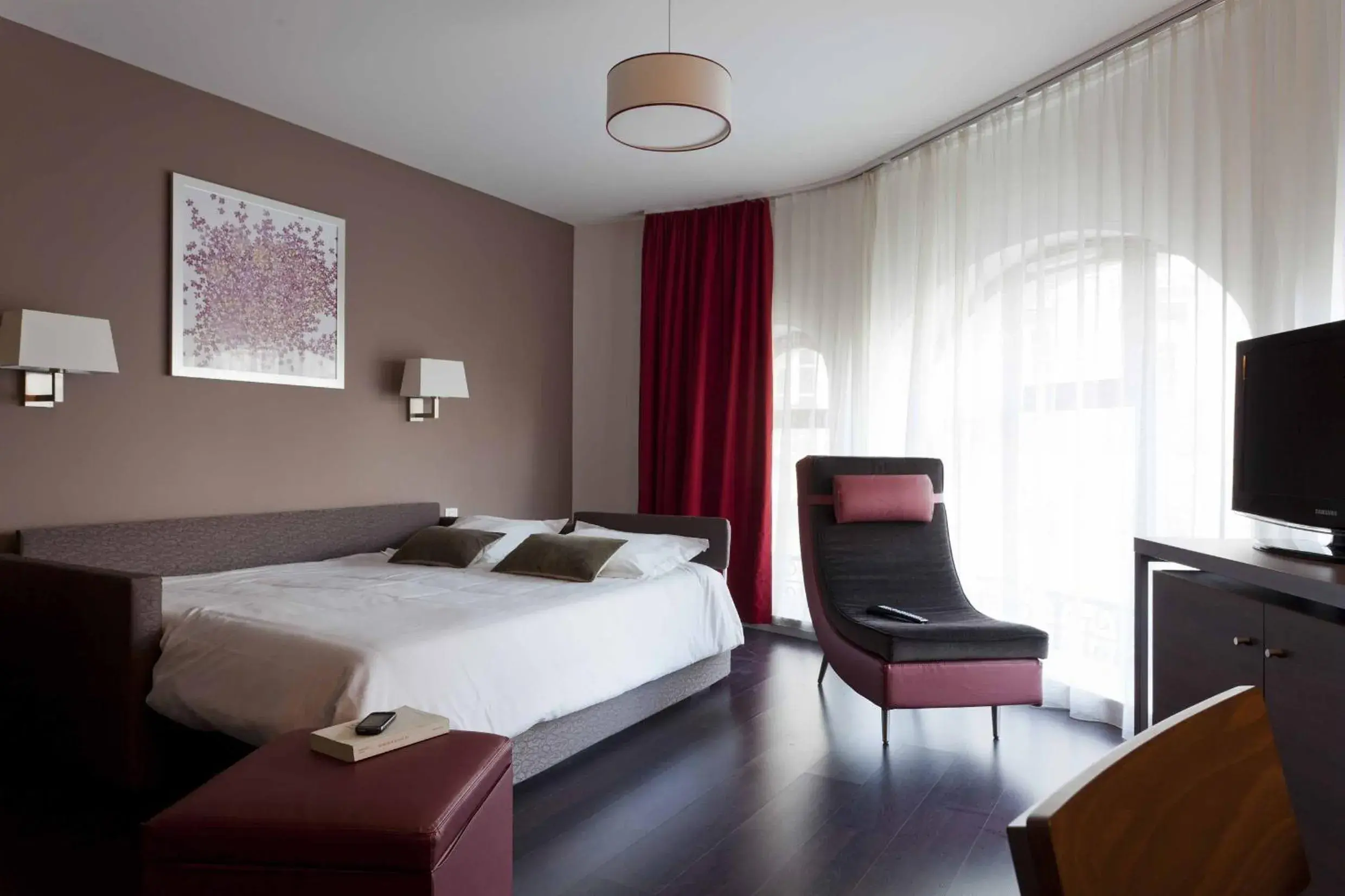 Photo of the whole room in City Lofthotel Saint-Etienne