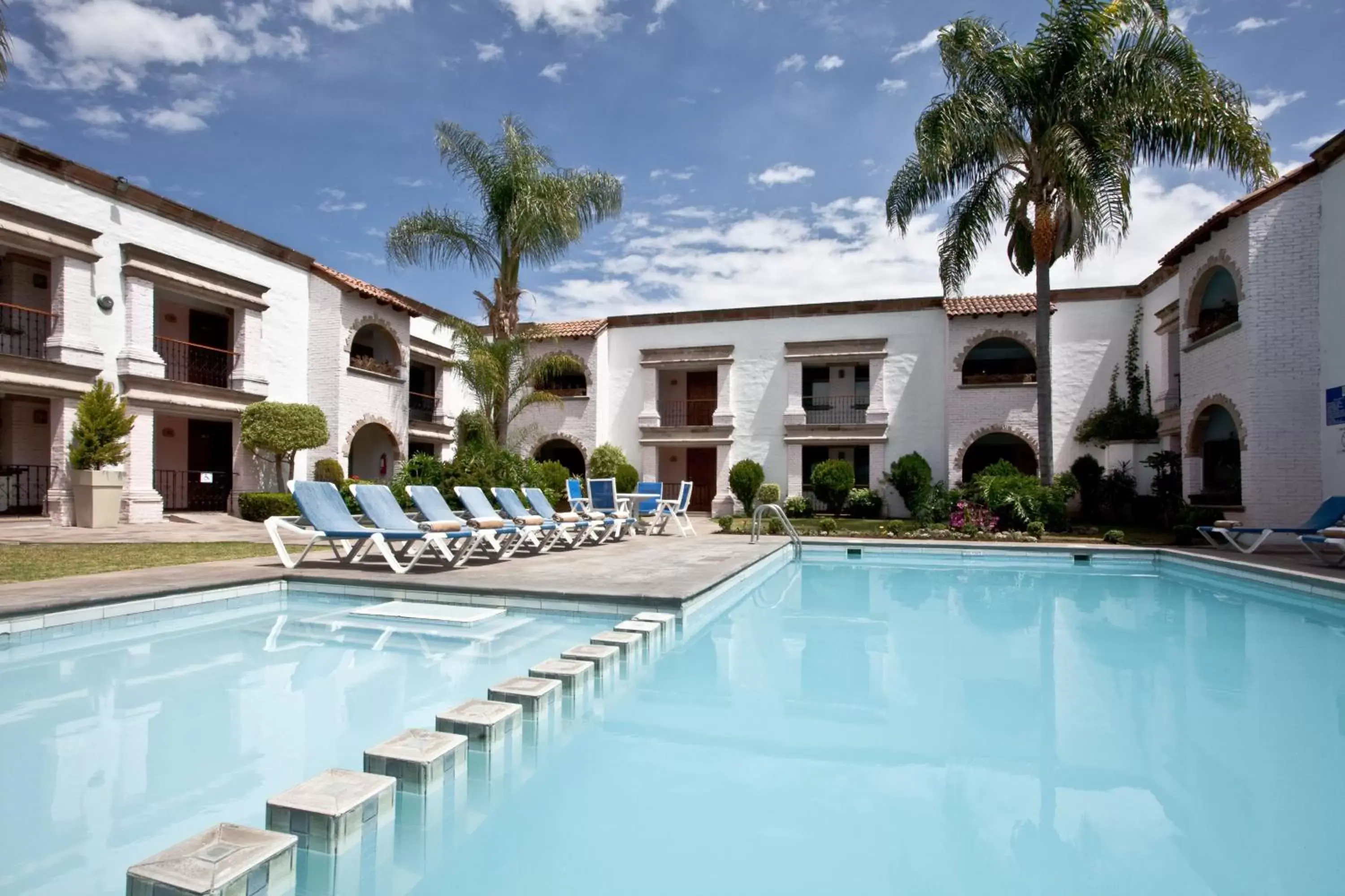 Swimming pool, Property Building in Holiday Inn Express Morelia, an IHG Hotel