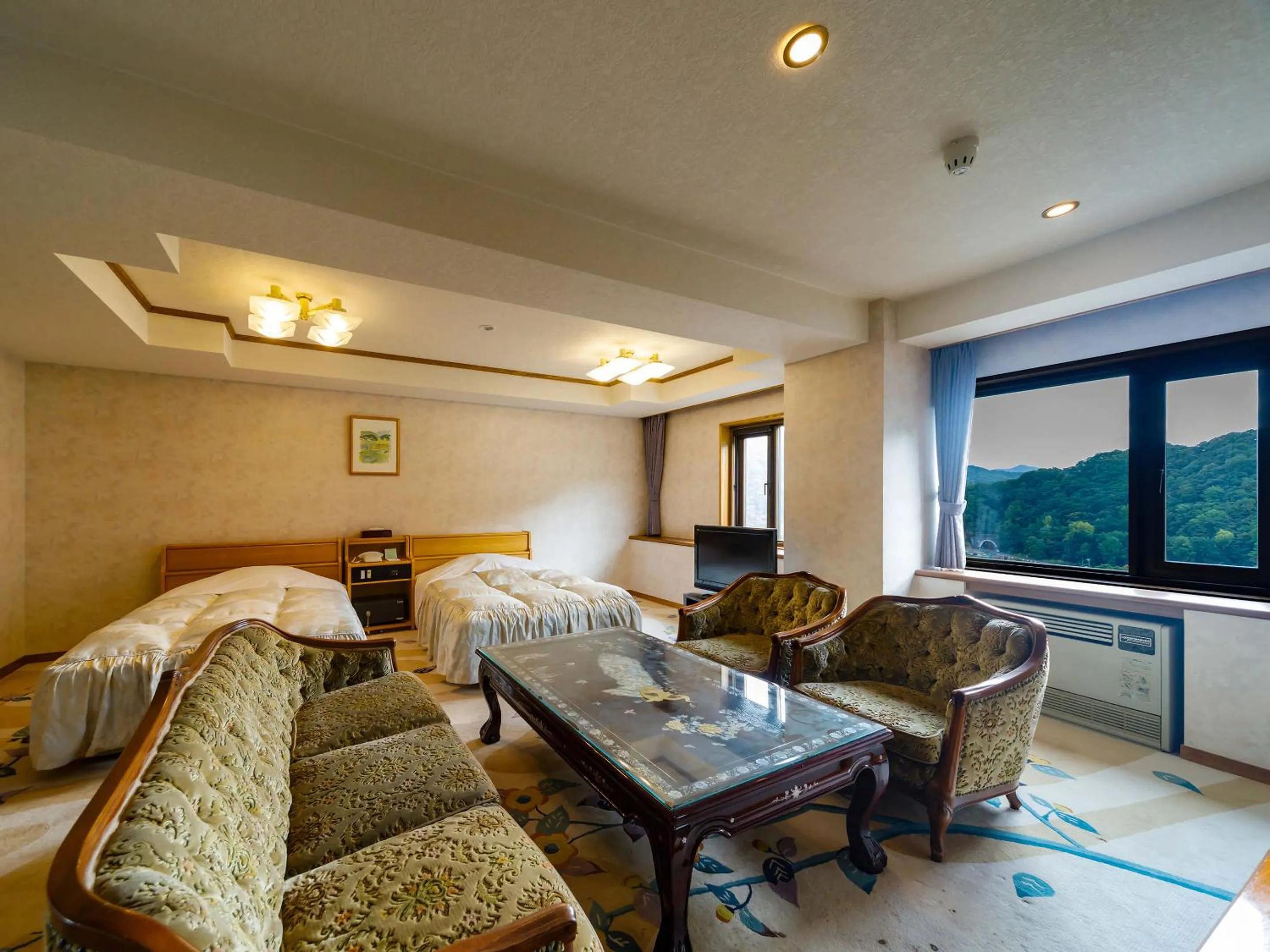 Living room, Bed in Jozankei View Hotel