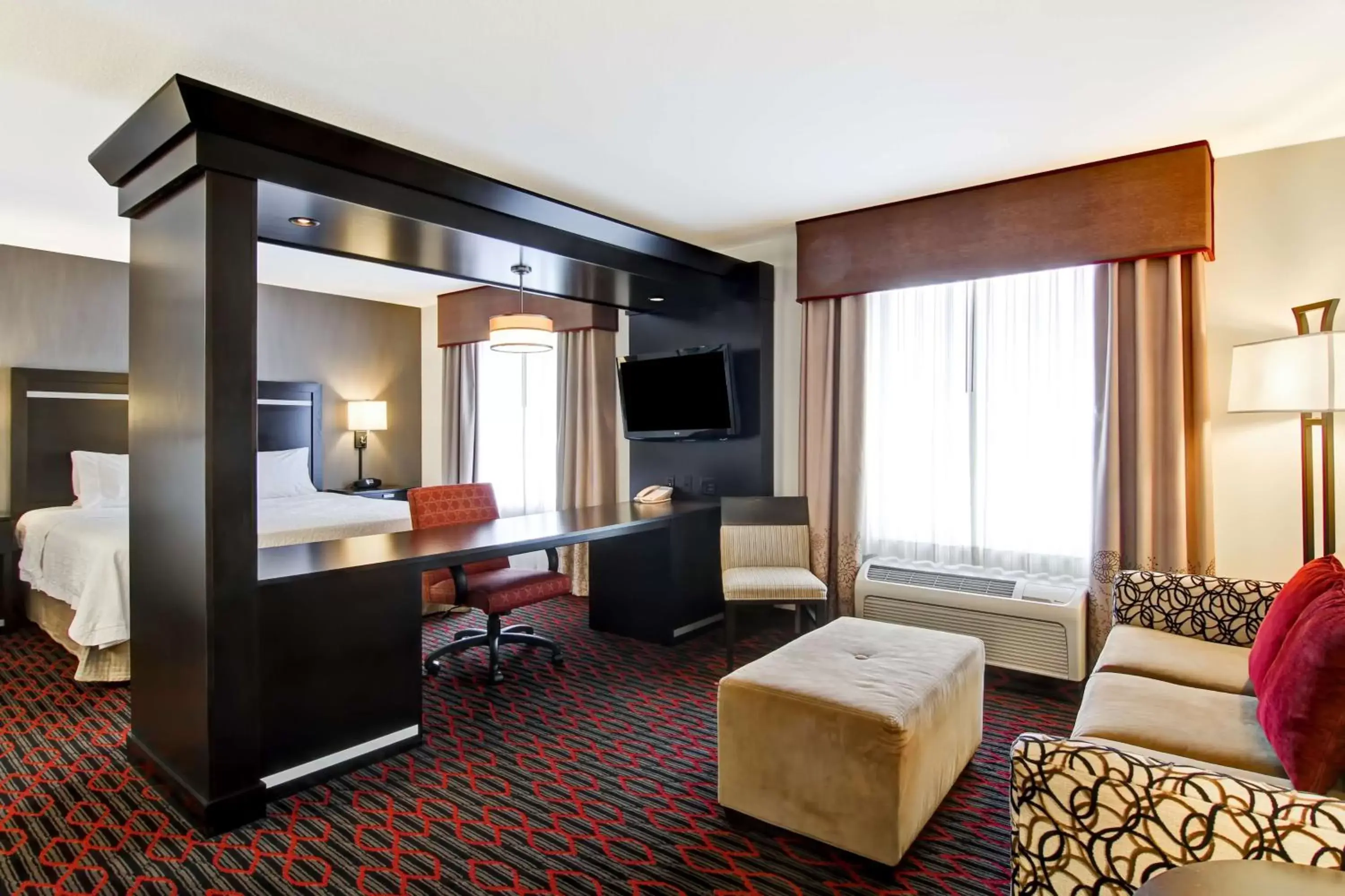 Bed, TV/Entertainment Center in Hampton Inn & Suites Red Deer