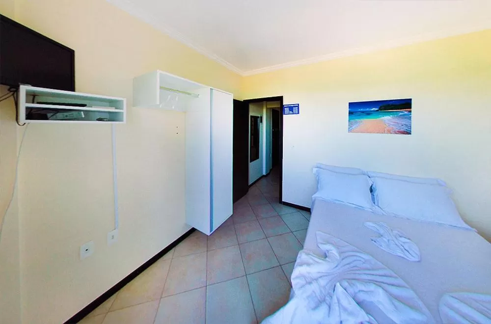 Bed in Pousada OceAnas Frente Mar Estaleiro