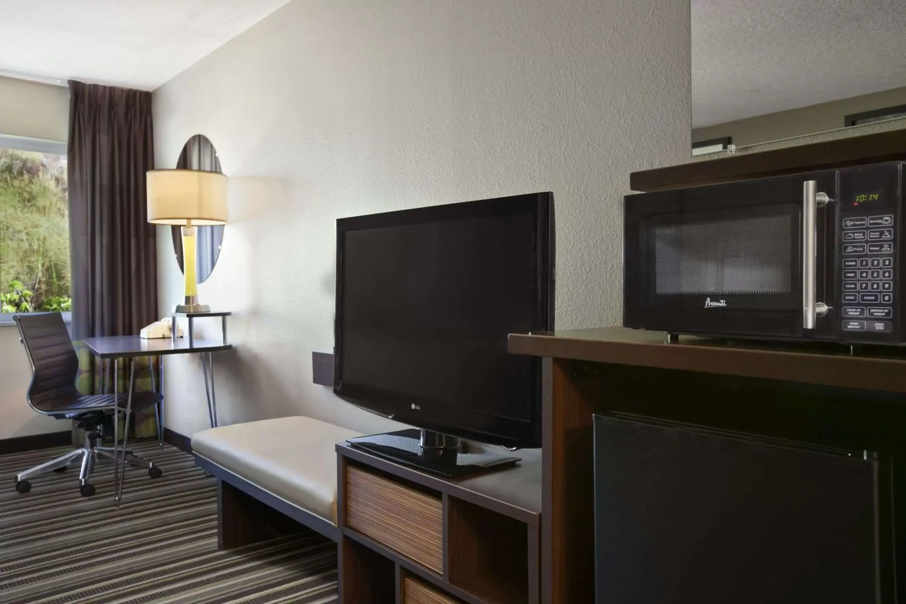 Photo of the whole room, TV/Entertainment Center in Super 8 by Wyndham Pocatello