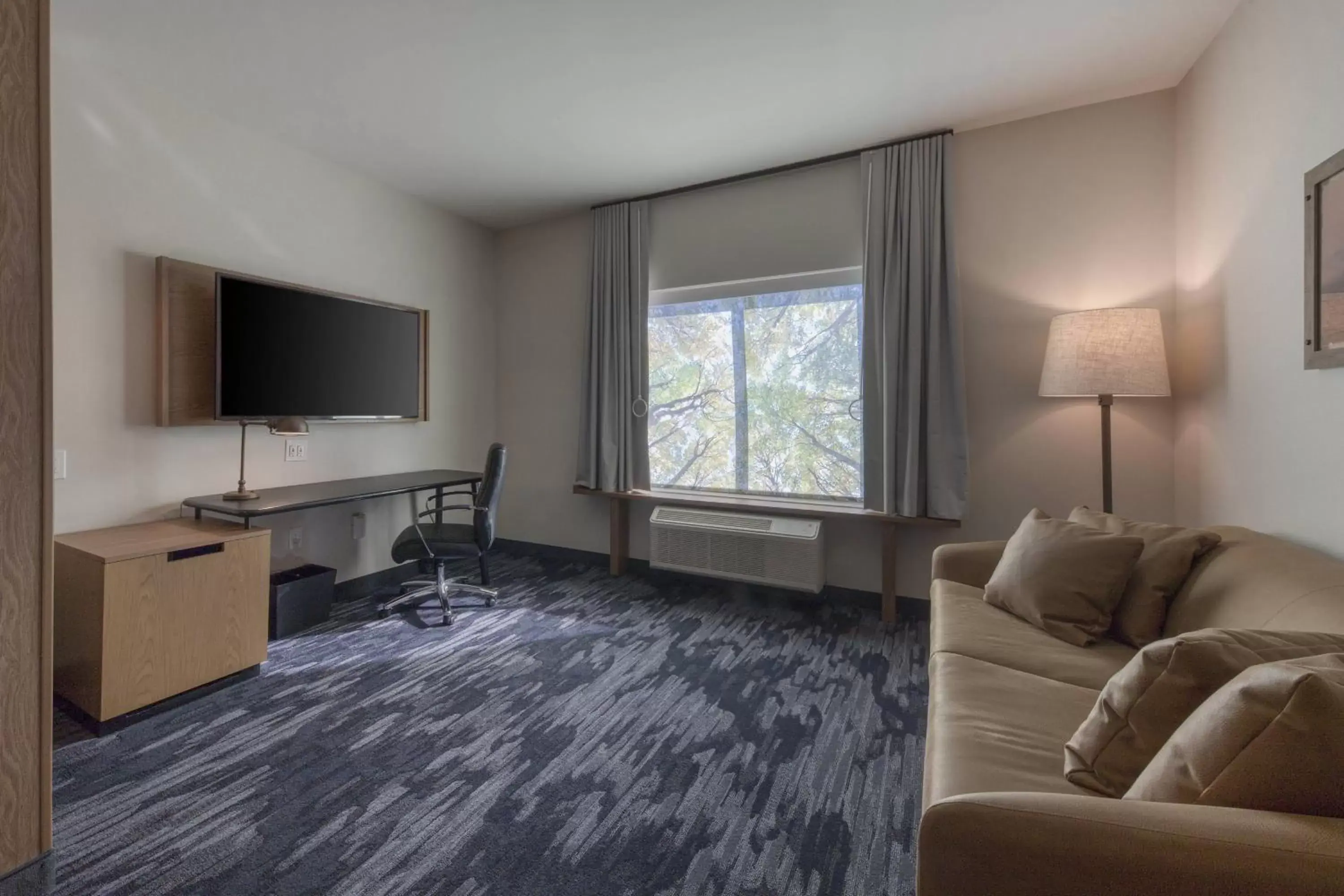 Photo of the whole room, Seating Area in Fairfield Inn & Suites by Marriott Charlotte Belmont