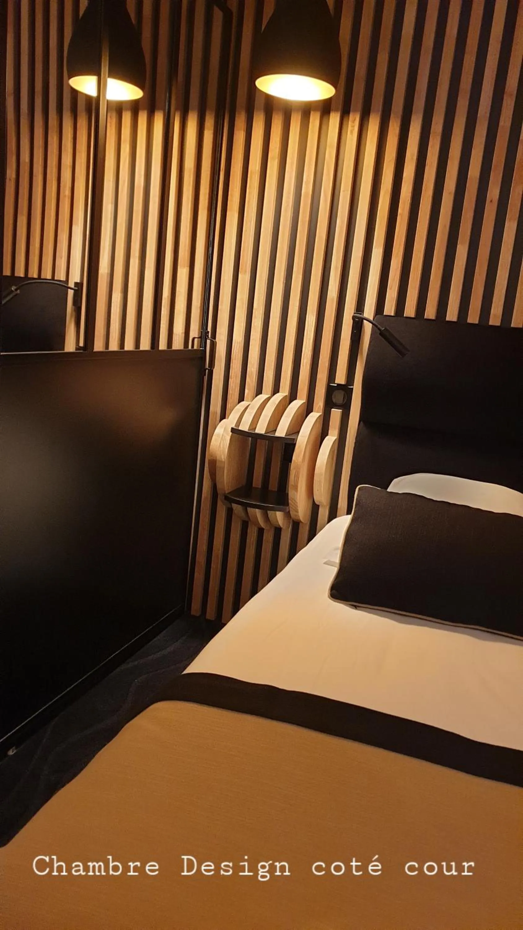 Bedroom in Hôtel Les Brises