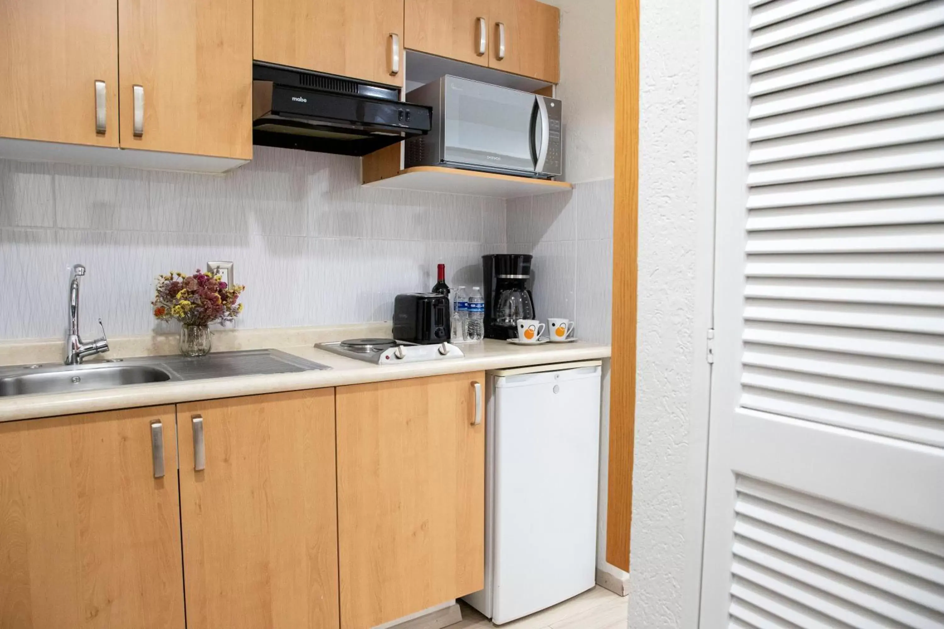Kitchen or kitchenette, Kitchen/Kitchenette in Suites Coben Apartamentos Amueblados