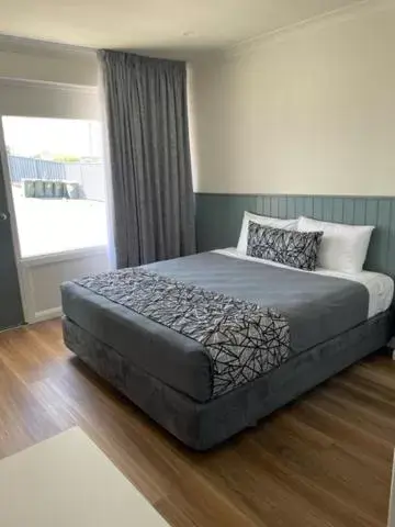 Bed in Surf Beach Motel Newcastle