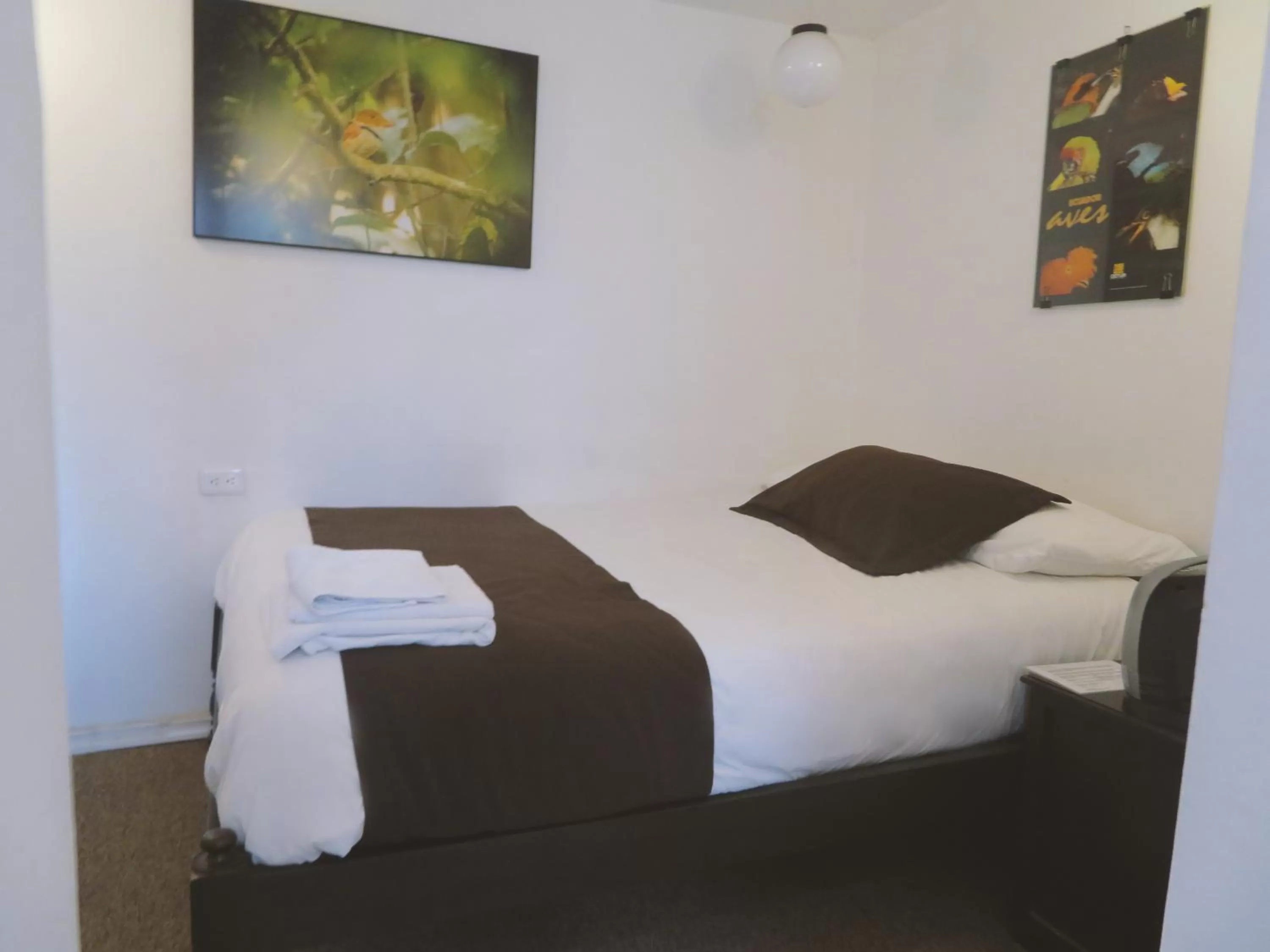 Bed in Bird Garden Guest House