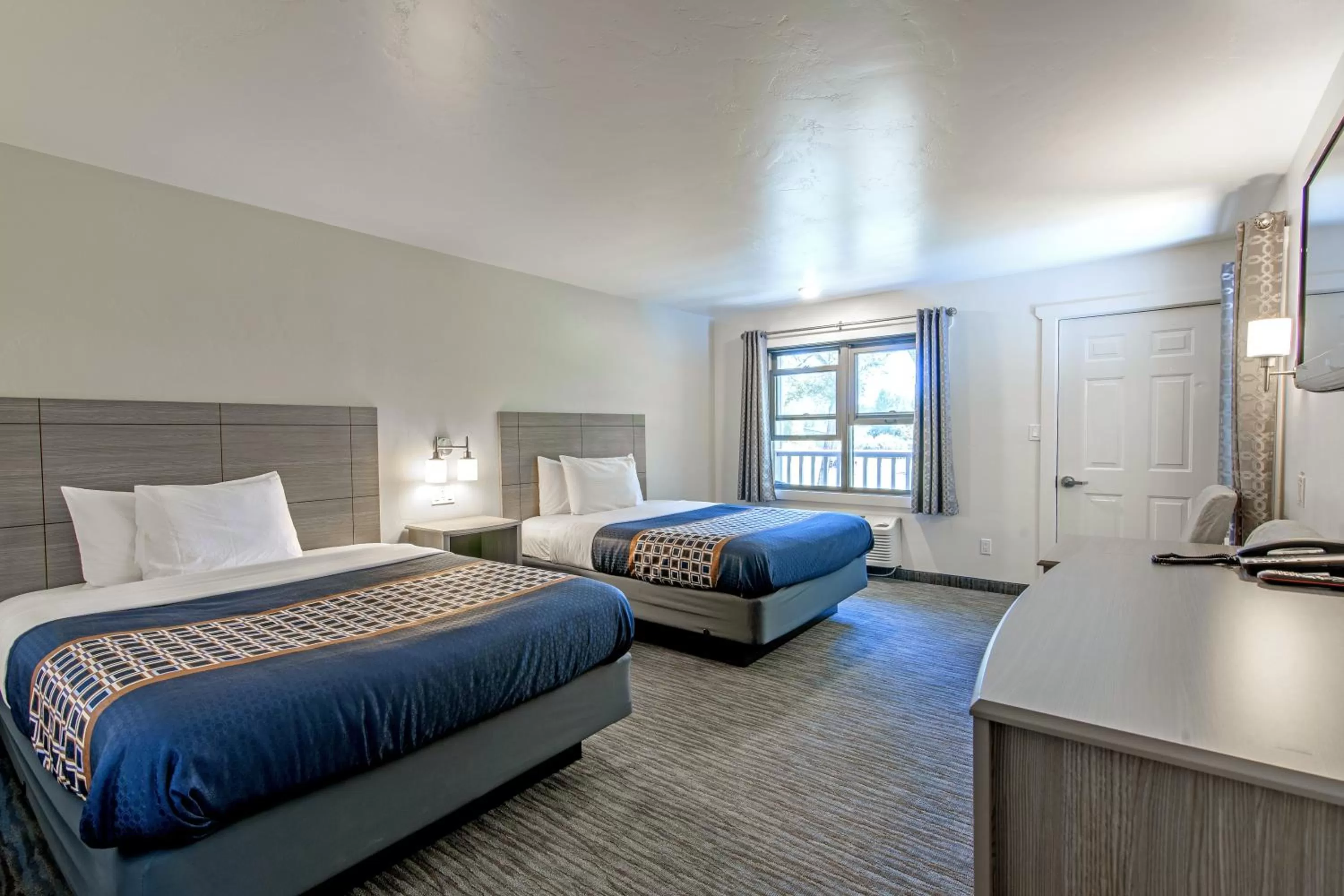 Bed in The Gunnison Inn at Dos Rios Golf Course